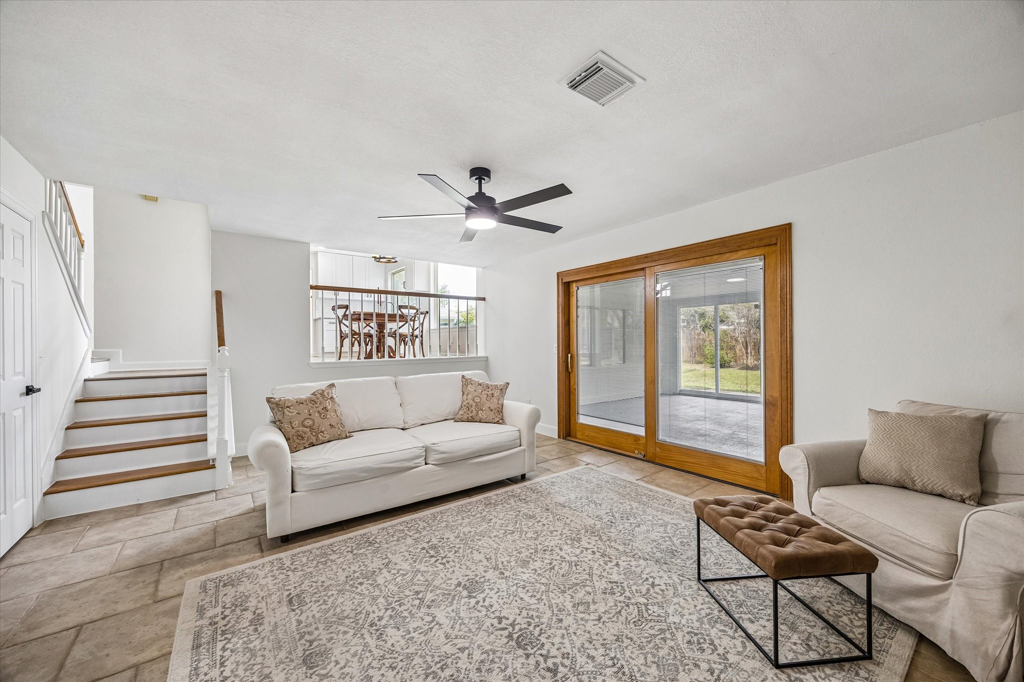 Living area that leads out to your indoor patio.