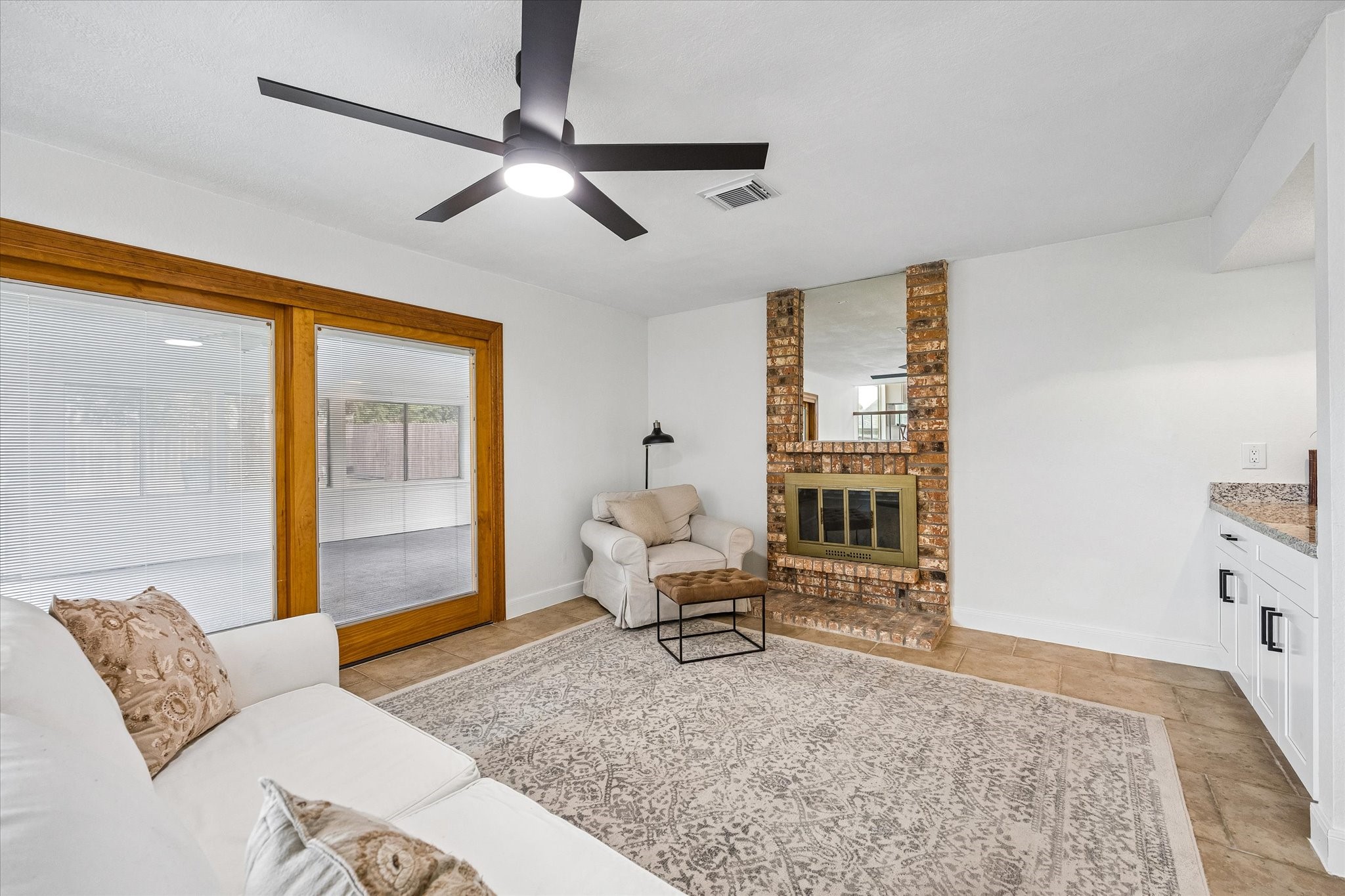 Spacious living area that flows seamlessly into your indoor patio, creating the perfect space to relax and unwind.