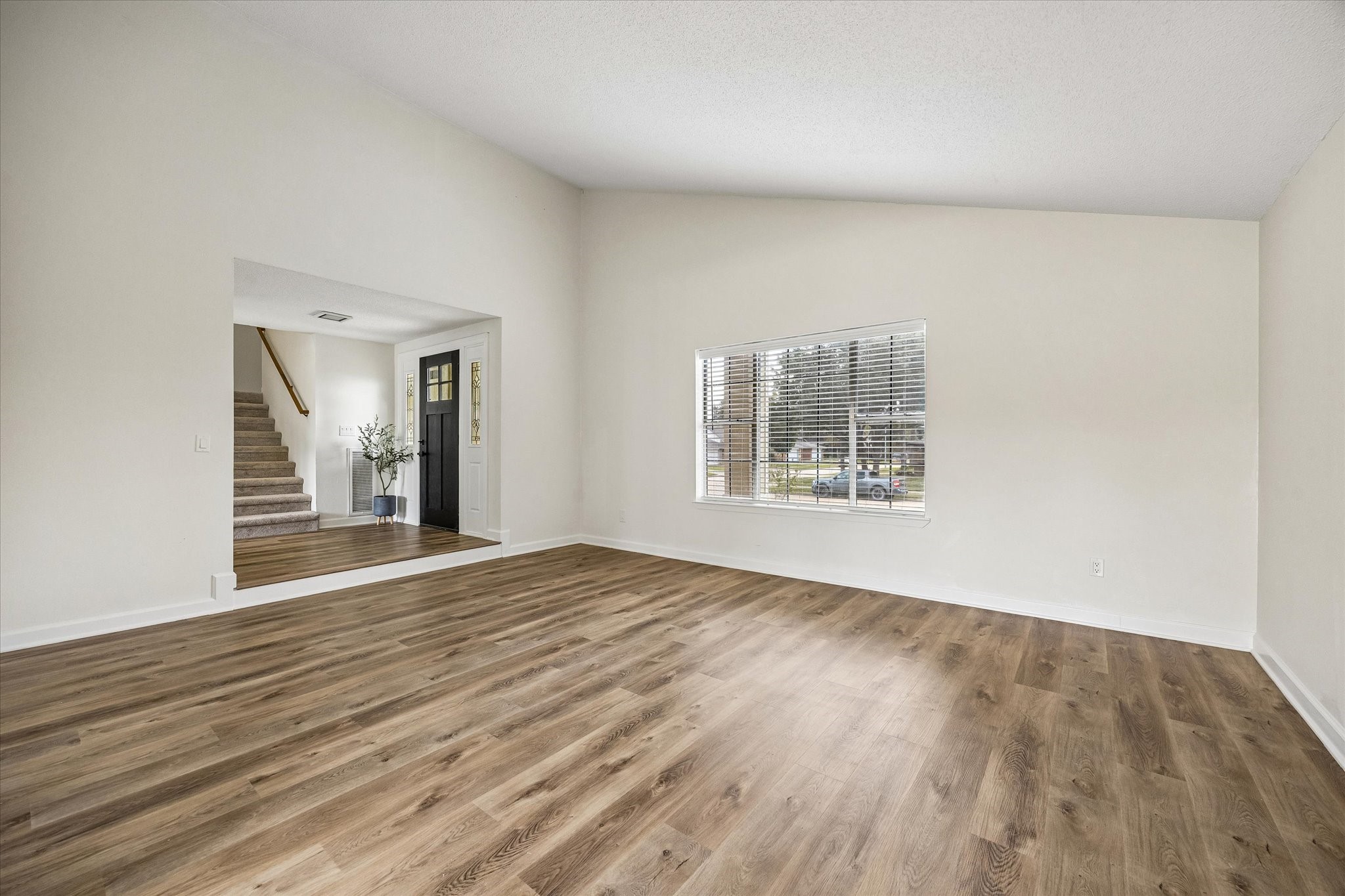 Spacious second living area, perfect for family relaxation and additional entertainment space.
