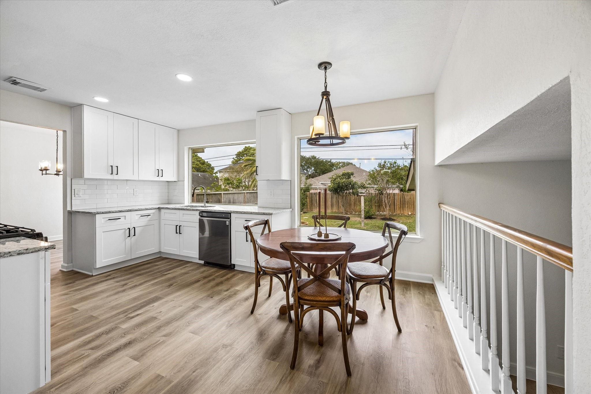 Beautiful, oversized windows offer peaceful views of your backyard while you cook, bringing natural light and a touch of the outdoors into your kitchen.