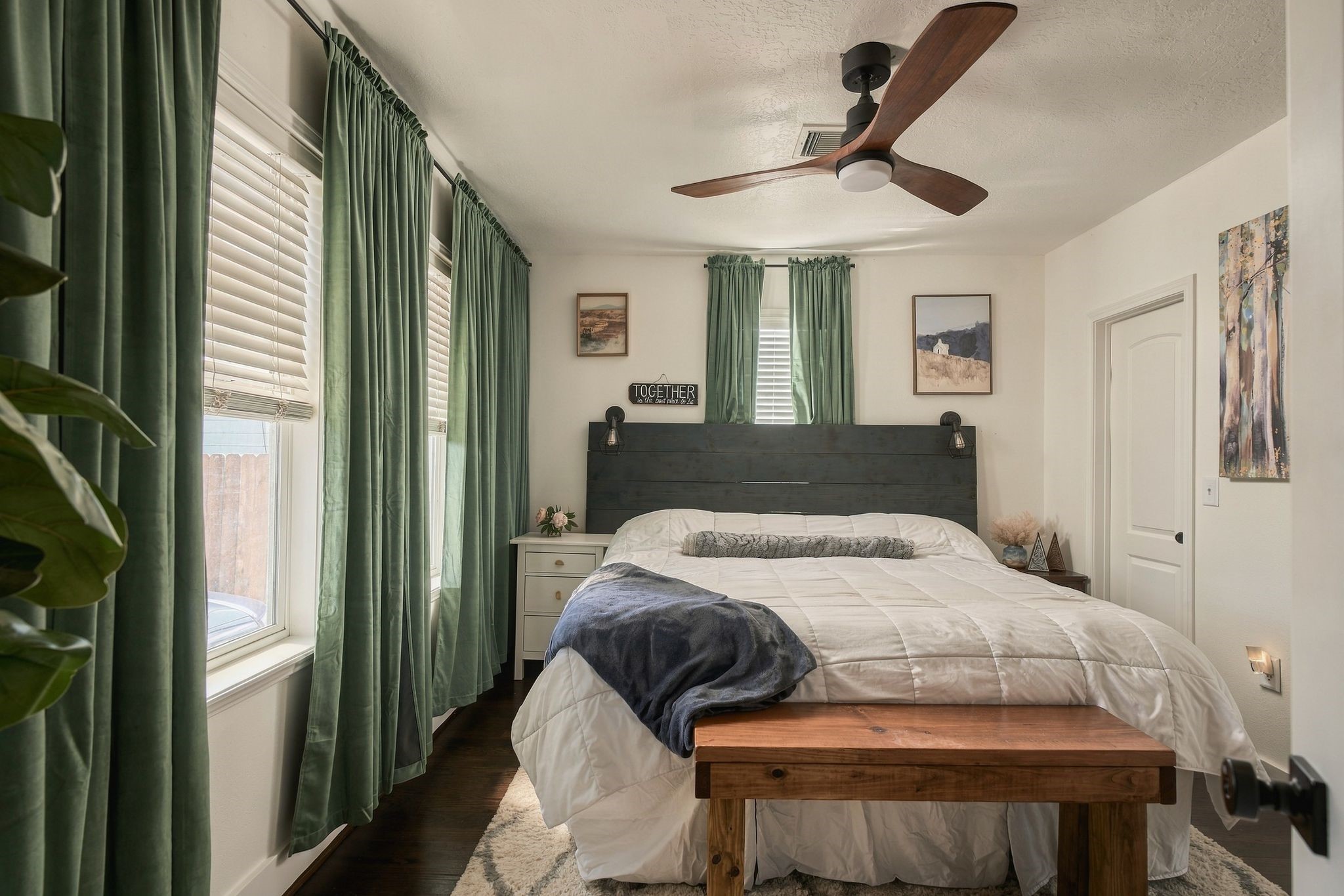 Comfortable primary bedroom featuring a walk-in closet and private en suite bathroom. This three-bedroom Brooke Smith home offers a functional layout with desirable everyday conveniences.