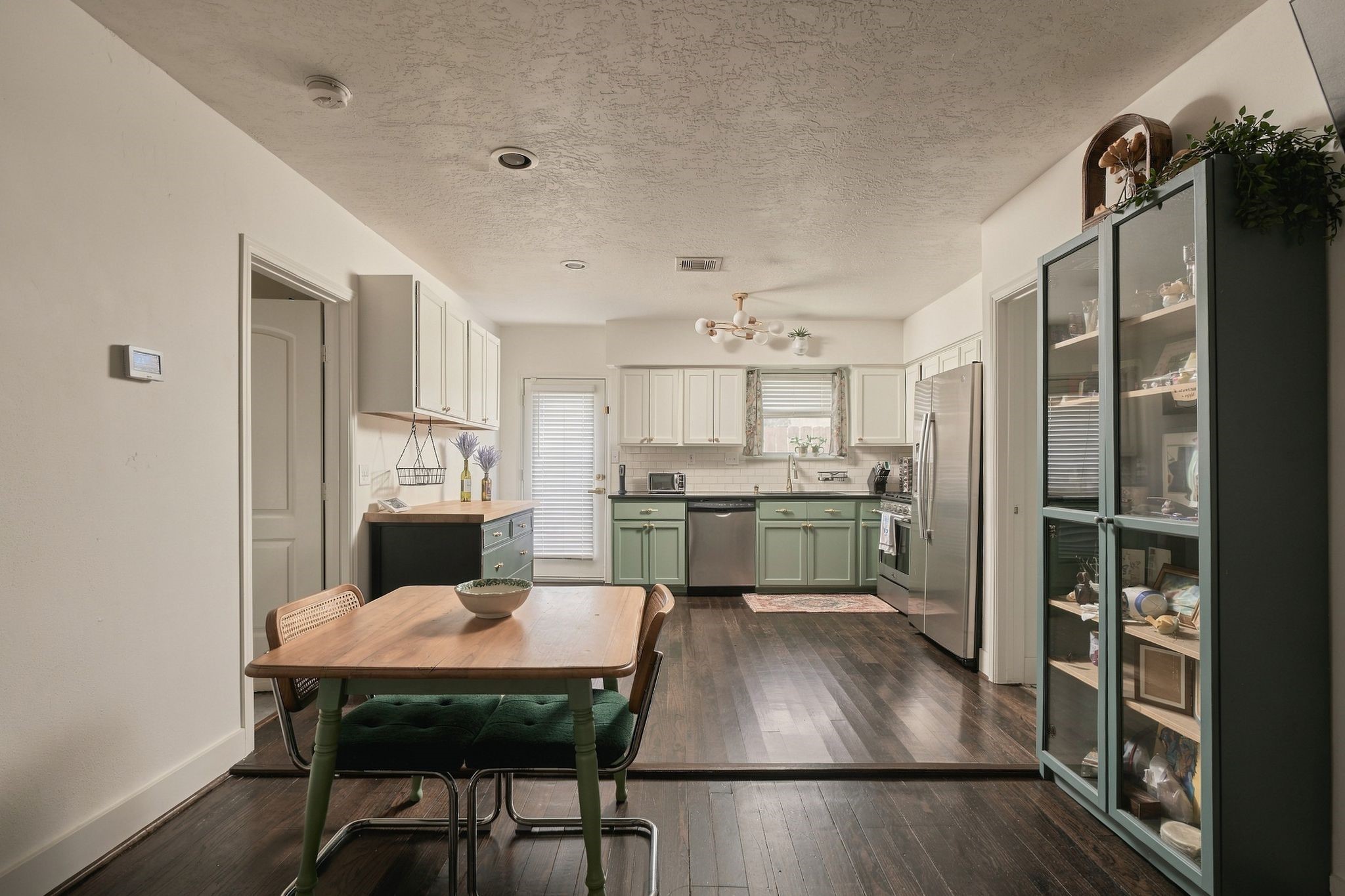 Flexible dining space between the living room and kitchen offers multiple furniture configurations. Enjoy an open, functional floor plan that makes excellent use of the home's 1,149 square feet.