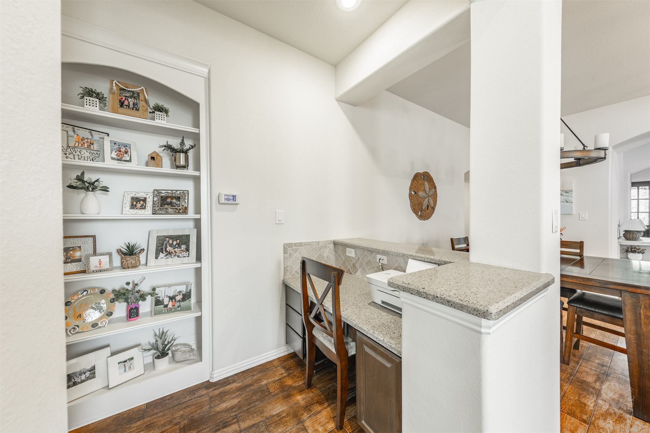 Photos include both previously furnished rooms and the homes current vacant condition to help buyers visualize the space and layout.