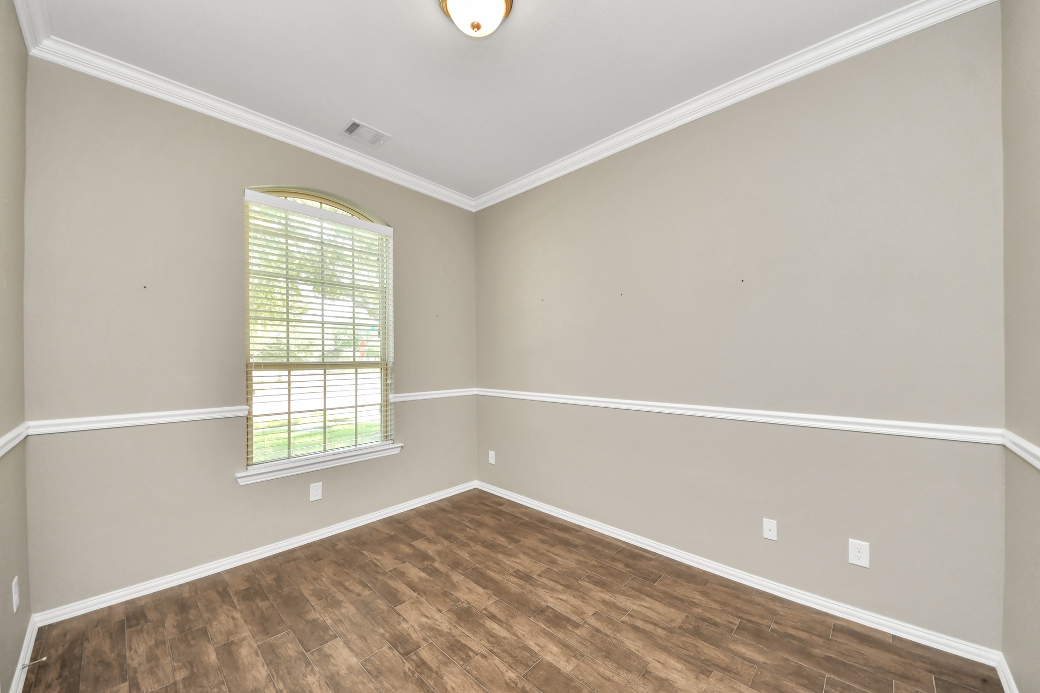 Photos include both previously furnished rooms and the homes current vacant condition to help buyers visualize the space and layout.