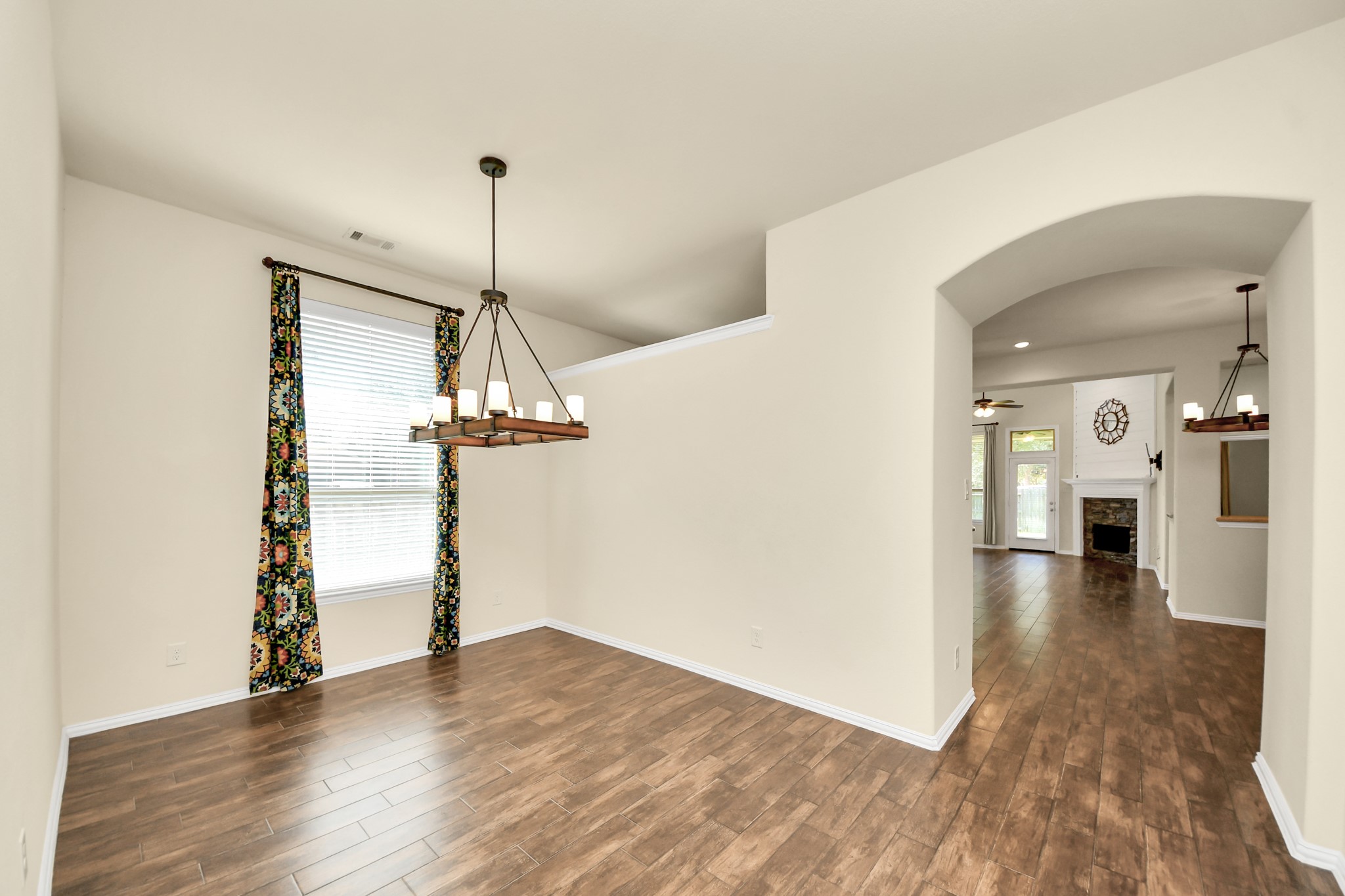 Photos include both previously furnished rooms and the homes current vacant condition to help buyers visualize the space and layout.