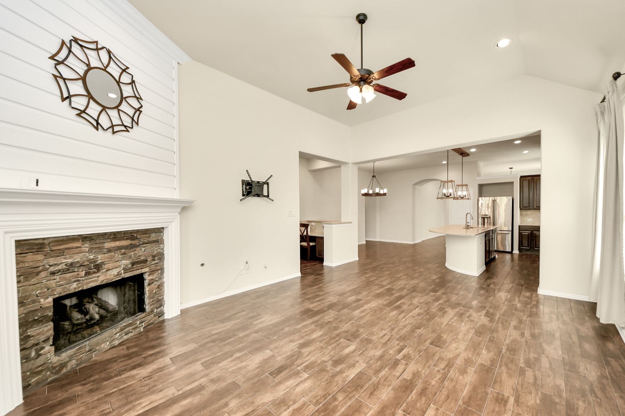 Photos include both previously furnished rooms and the homes current vacant condition to help buyers visualize the space and layout.