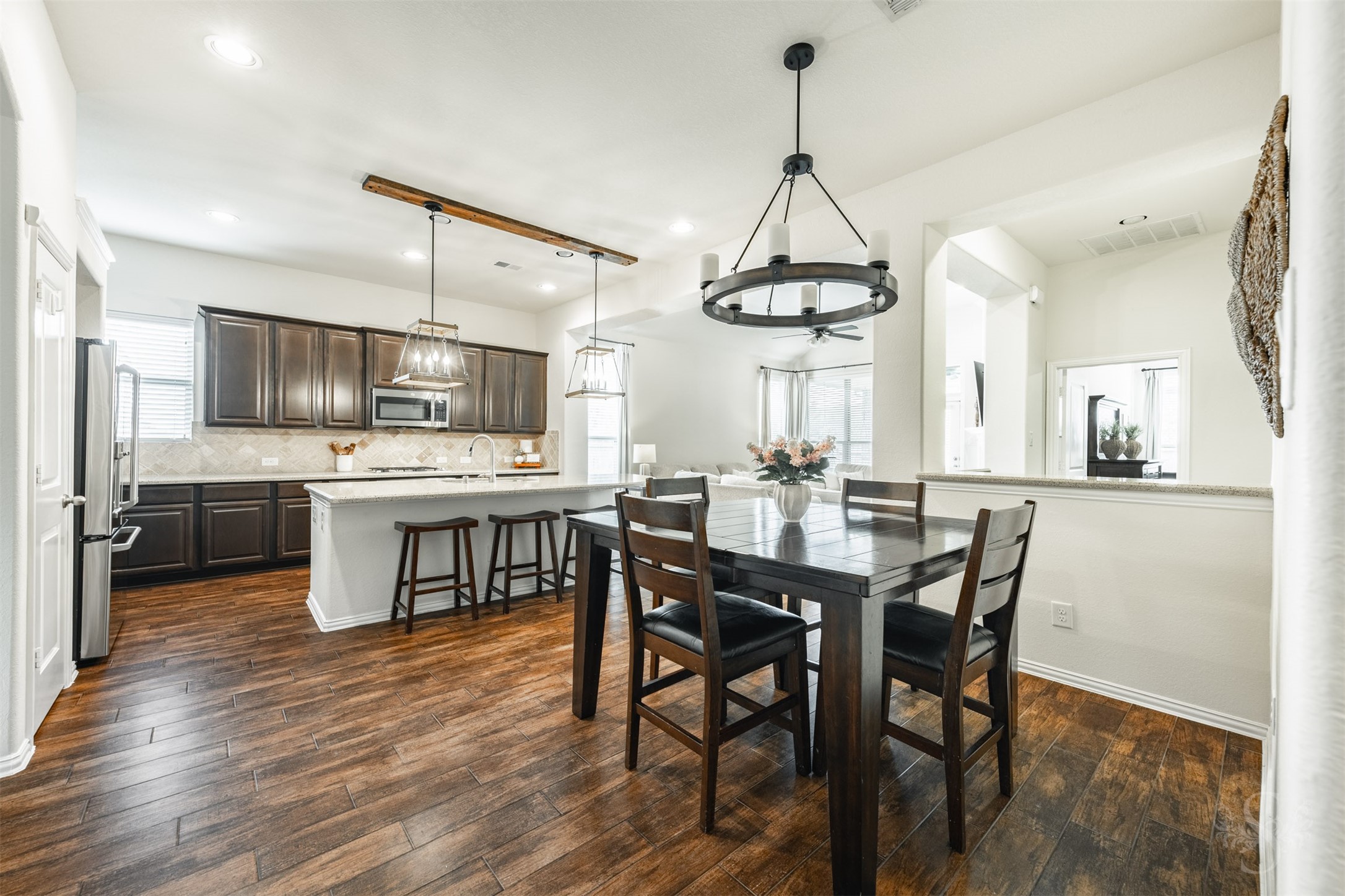 Photos include both previously furnished rooms and the homes current vacant condition to help buyers visualize the space and layout.