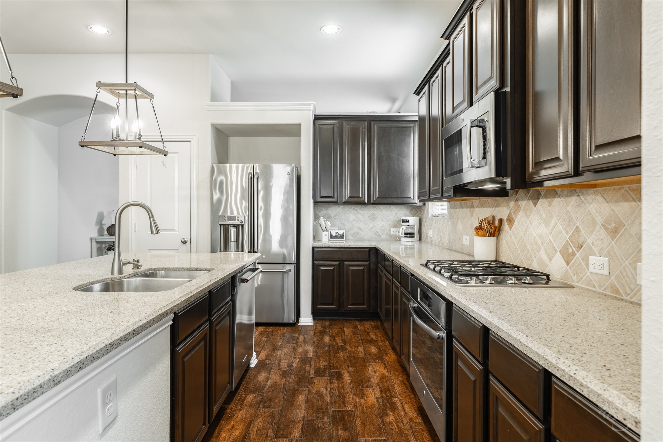 Photos include both previously furnished rooms and the homes current vacant condition to help buyers visualize the space and layout.