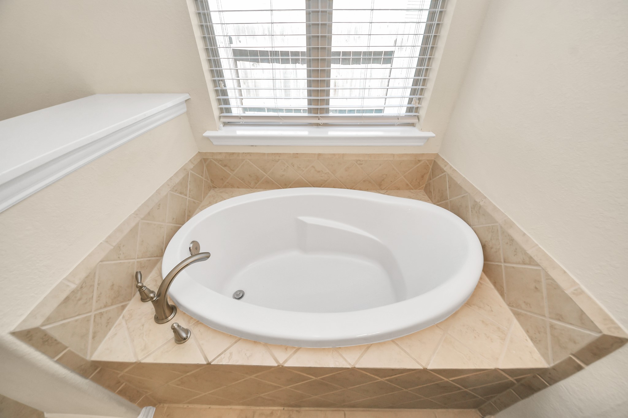 Photos include both previously furnished rooms and the homes current vacant condition to help buyers visualize the space and layout.