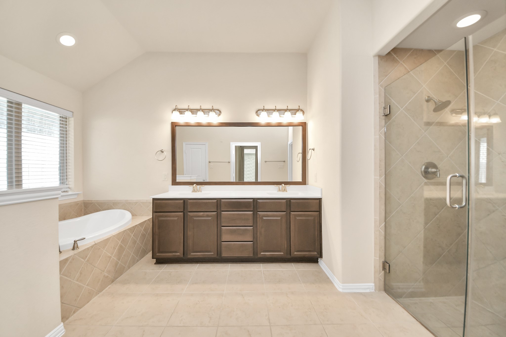 Photos include both previously furnished rooms and the homes current vacant condition to help buyers visualize the space and layout.