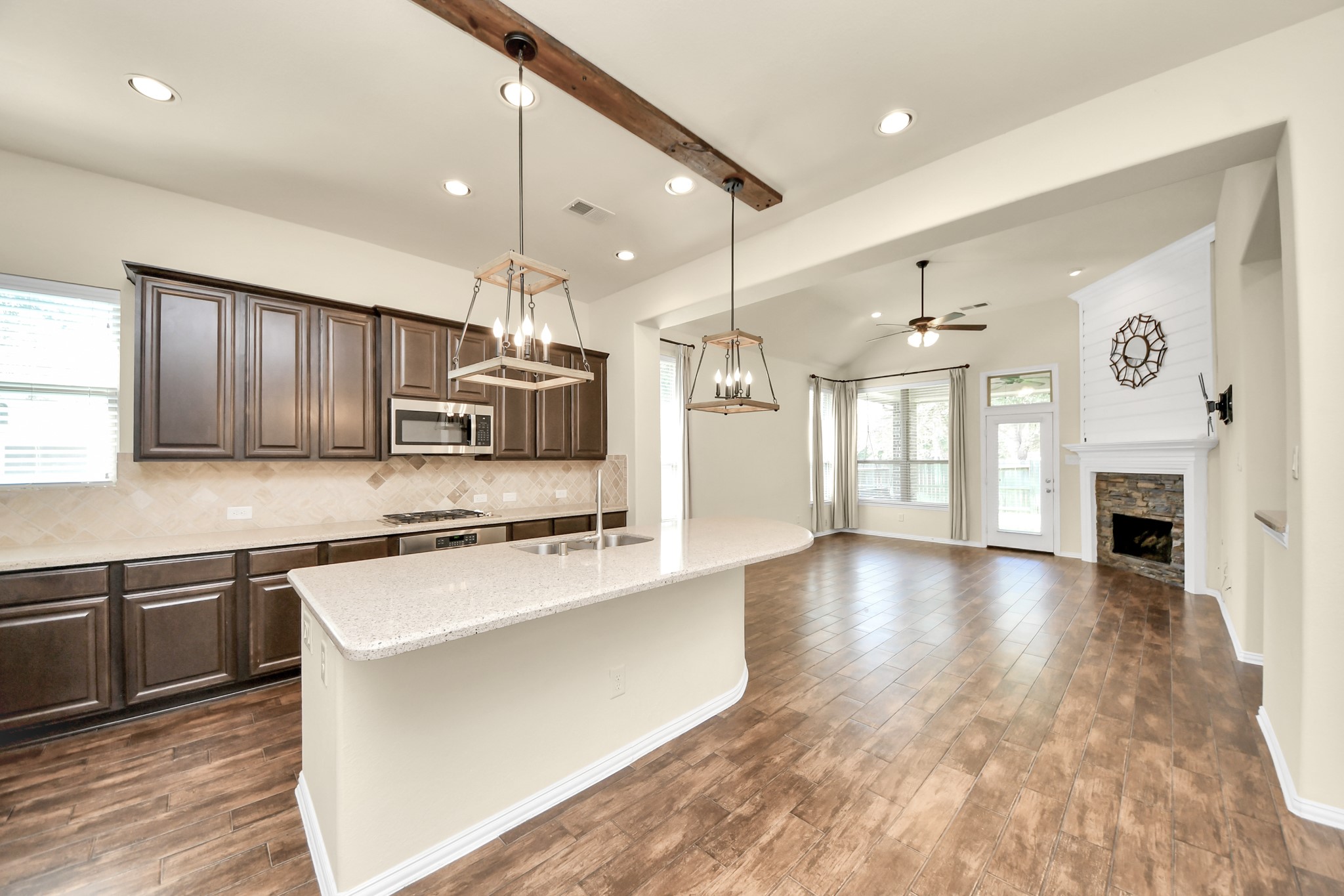 Photos include both previously furnished rooms and the homes current vacant condition to help buyers visualize the space and layout.