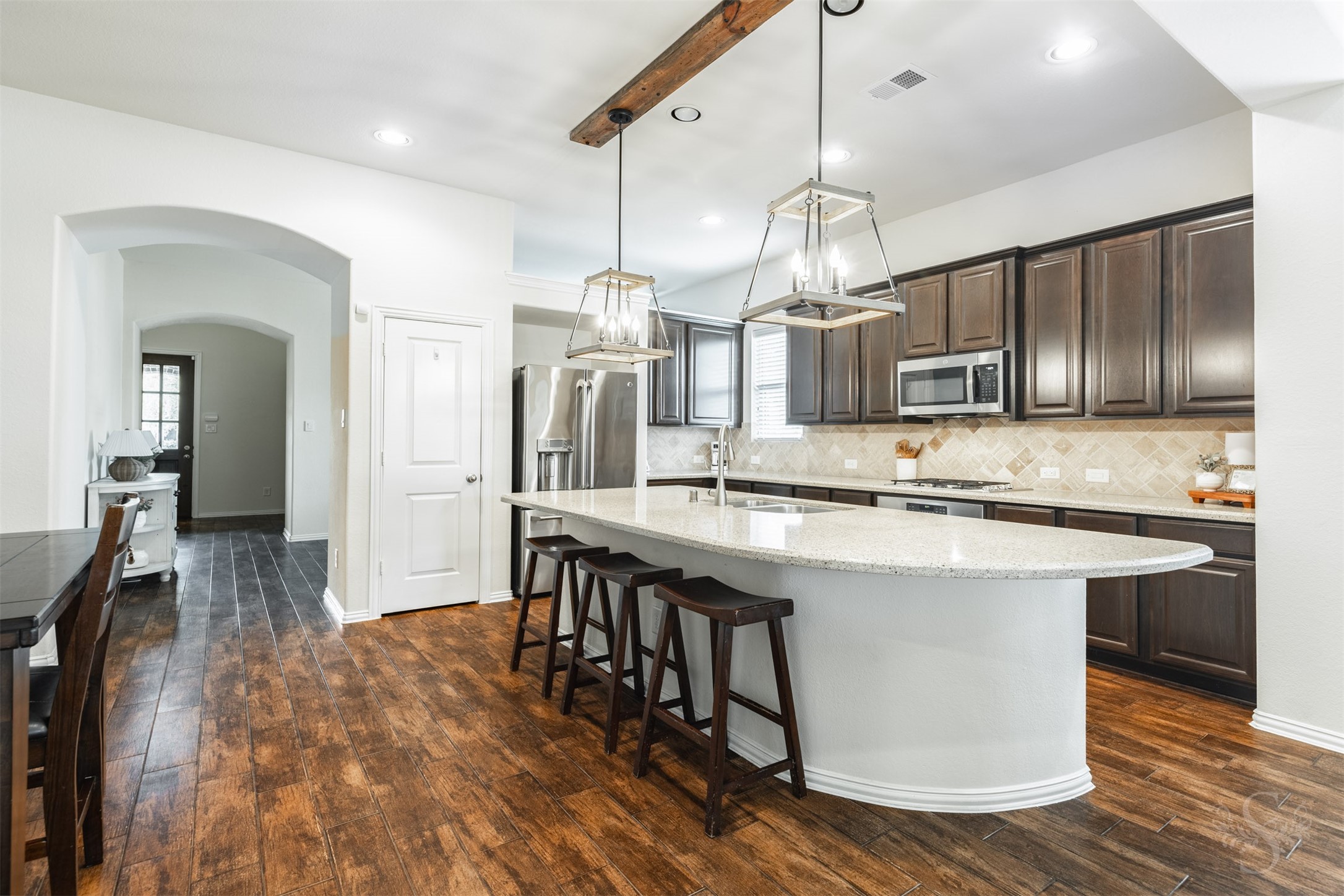 Photos include both previously furnished rooms and the homes current vacant condition to help buyers visualize the space and layout.