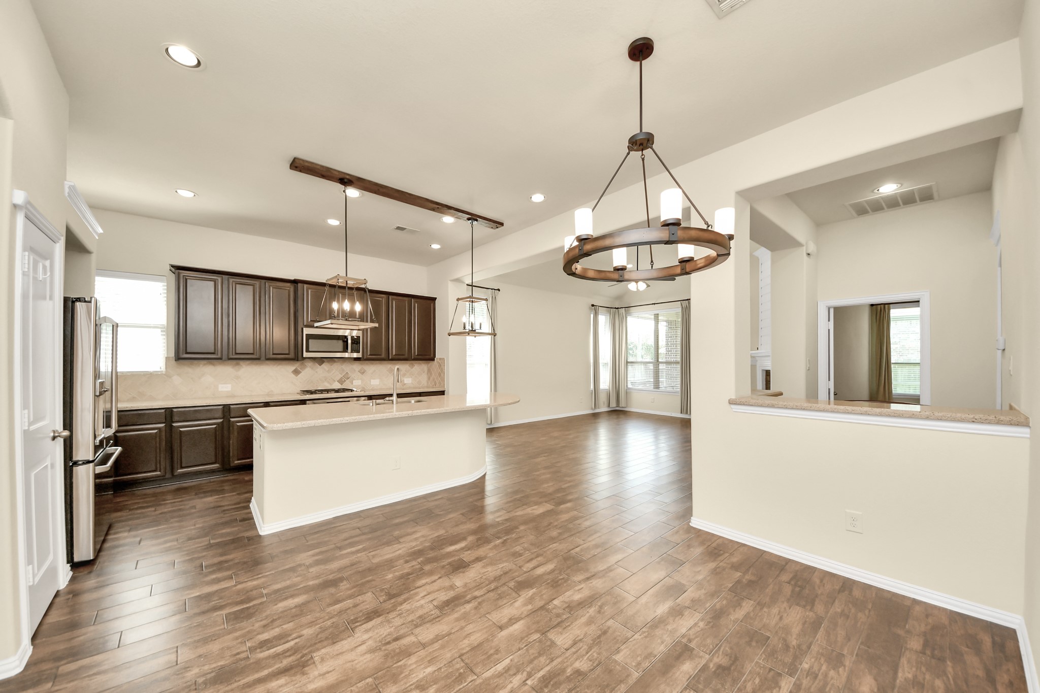 Photos include both previously furnished rooms and the homes current vacant condition to help buyers visualize the space and layout.
