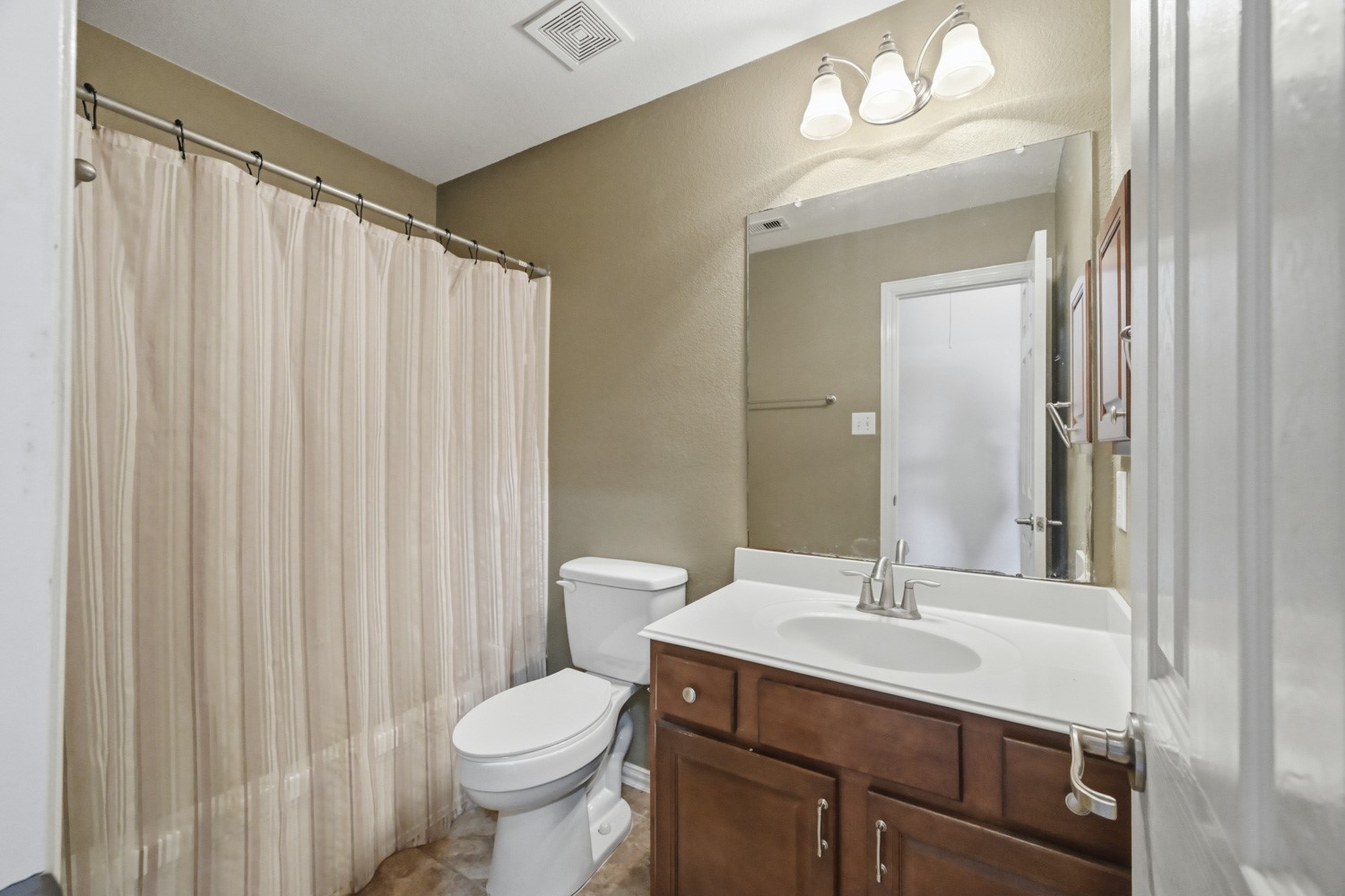 Step into a well-appointed full secondary bathroom designed for everyday comfort and convenience.