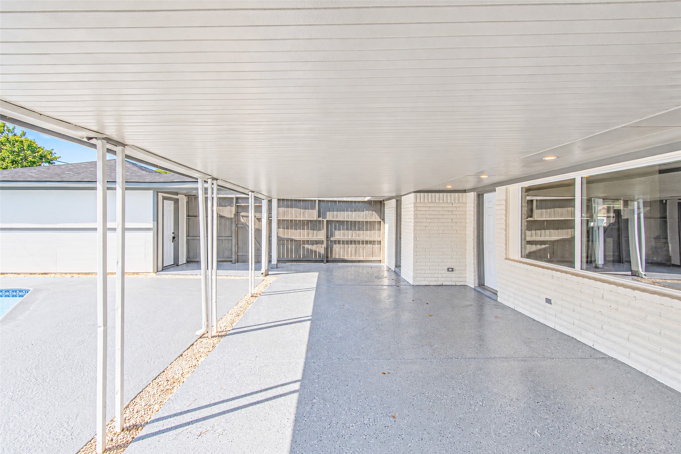 Experience seamless indoor-outdoor living in this expansive patio area, enhanced by energy-efficient low-E windows that invite natural light while maintaining comfort.