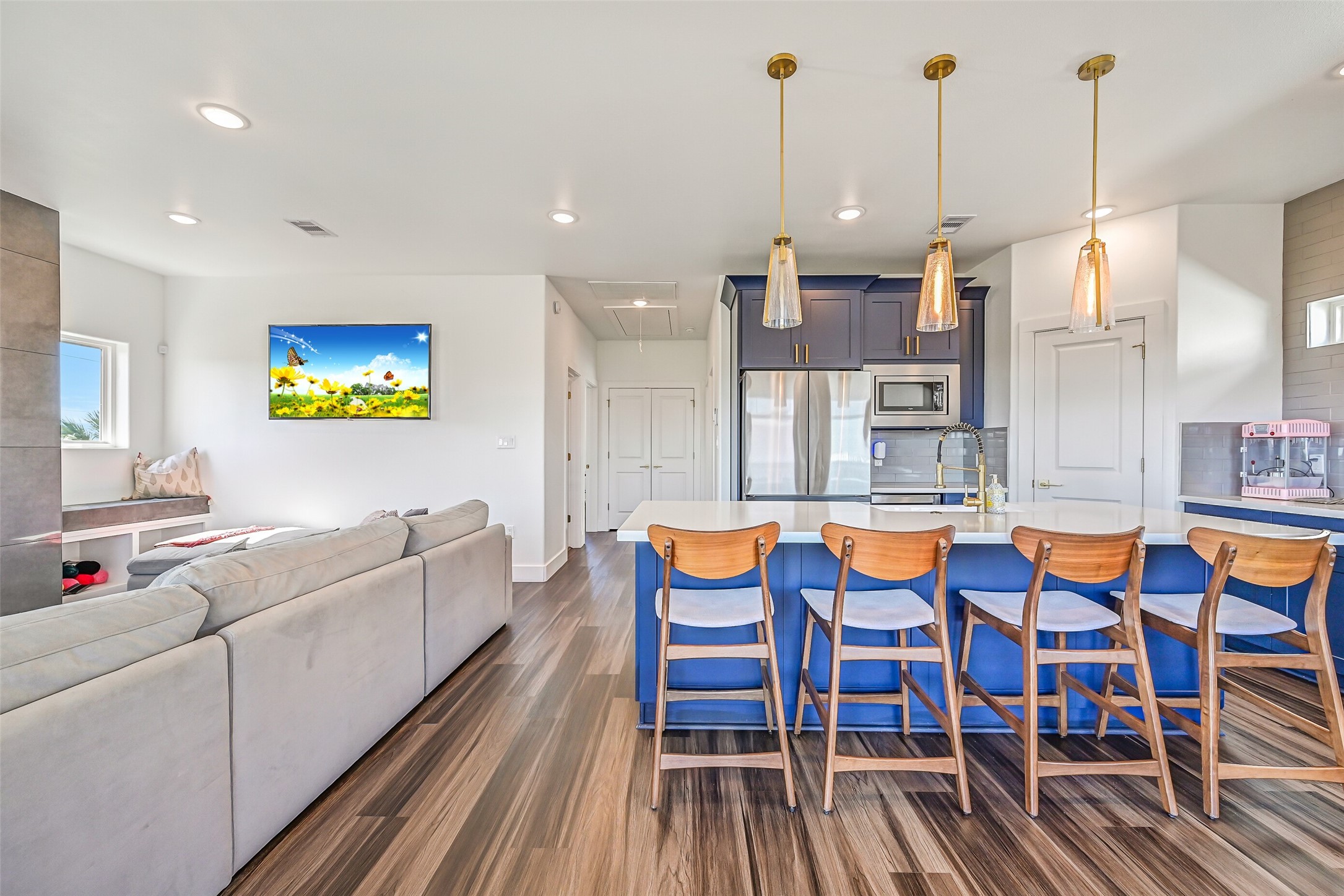 Step inside to an inviting open-concept kitchen and living area, perfect for entertaining and everyday living.