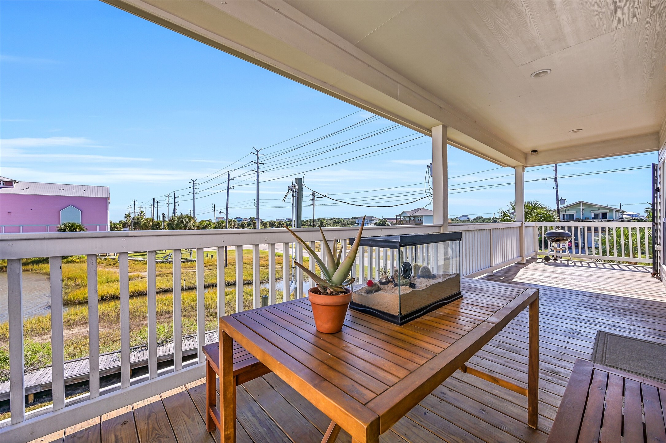 Enjoy dining alfresco, entertaining guests, or sipping your morning coffee just steps from the water.