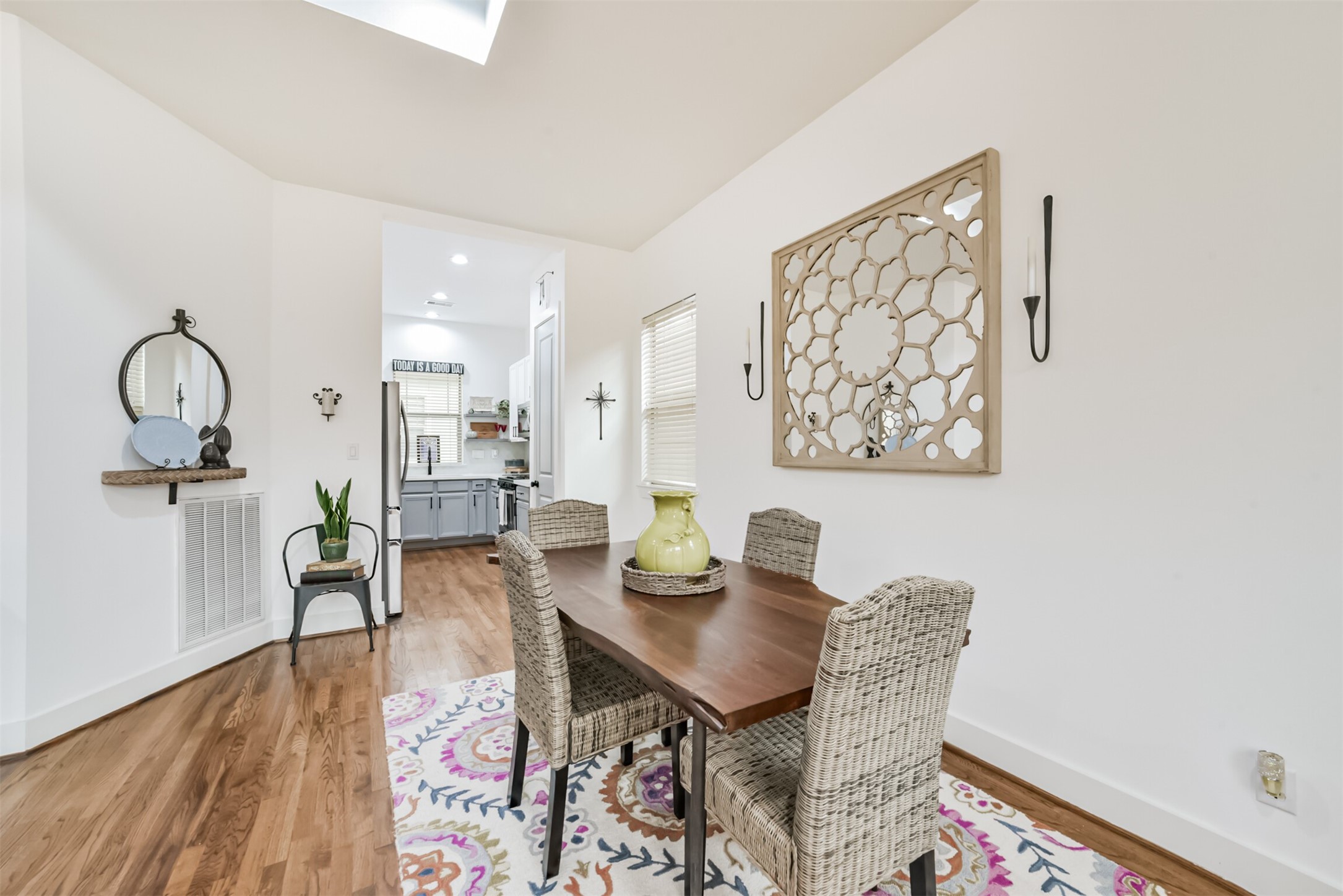 Light-filled dining area flowing effortlessly into the kitchen and living room