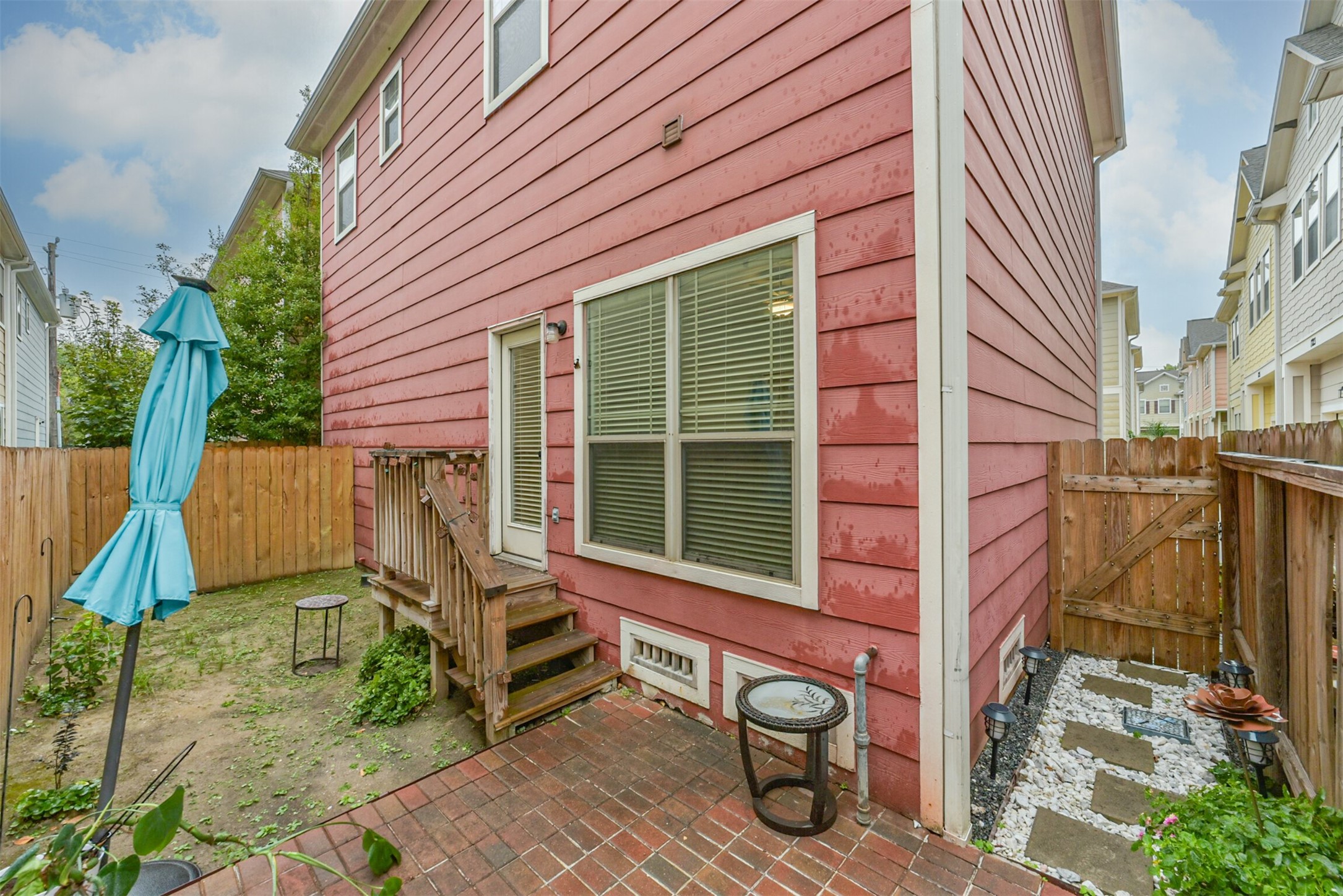 Nice size backyard with brick paver patio and recently replaced fence!