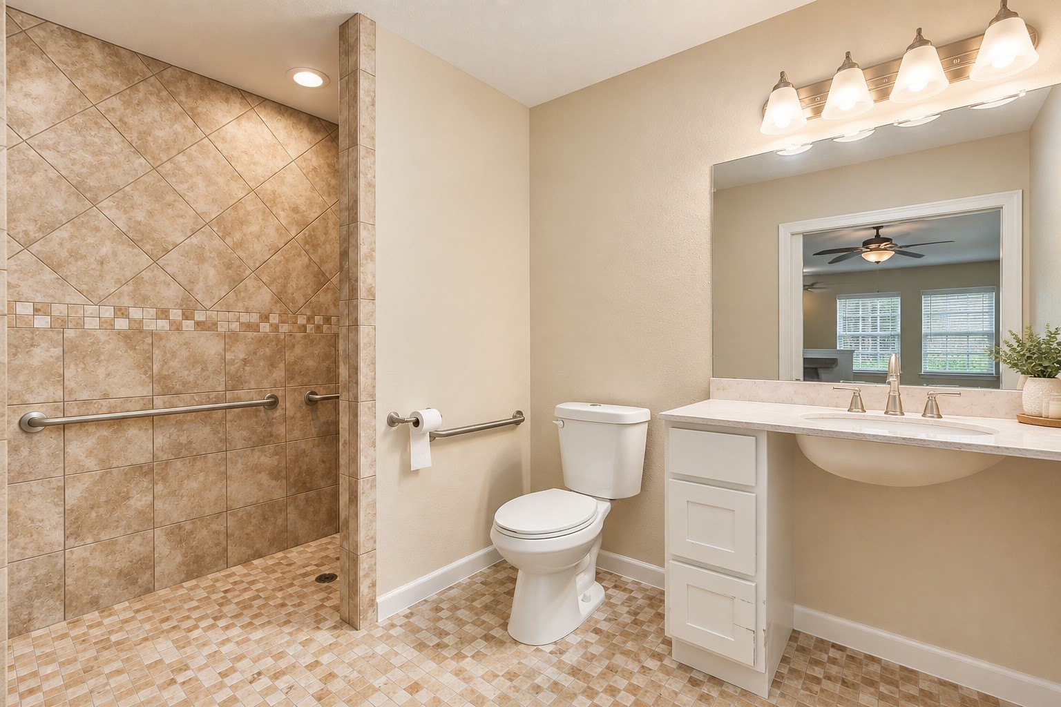 Spacious bathroom in the detached living quarters featuring a walk-in shower with elegant tilework, modern fixtures, and a large vanity with ample lighting.