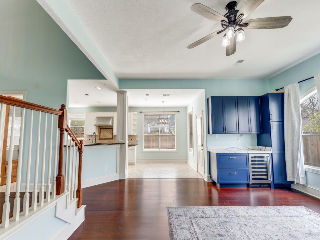 Front view of the built in wine bar, breakfast bar and the ample light which flows through the main living space. Front view of the built in wine bar, breakfast bar and the ample light which flows through the main living space.