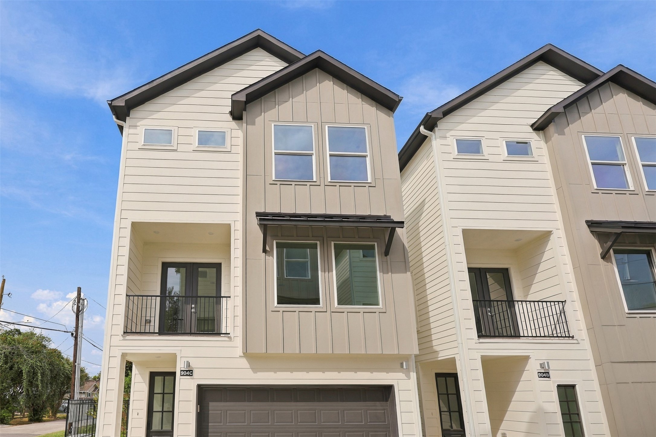 A daytime view offers another look at the home and balcony.