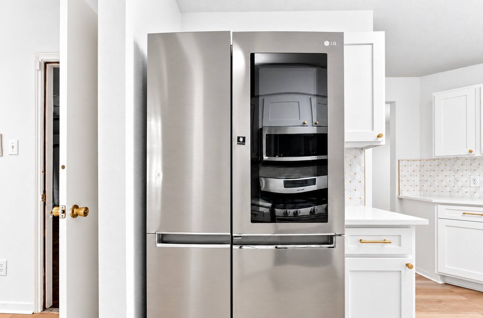 A BRAND NEW fridge comes with the home!