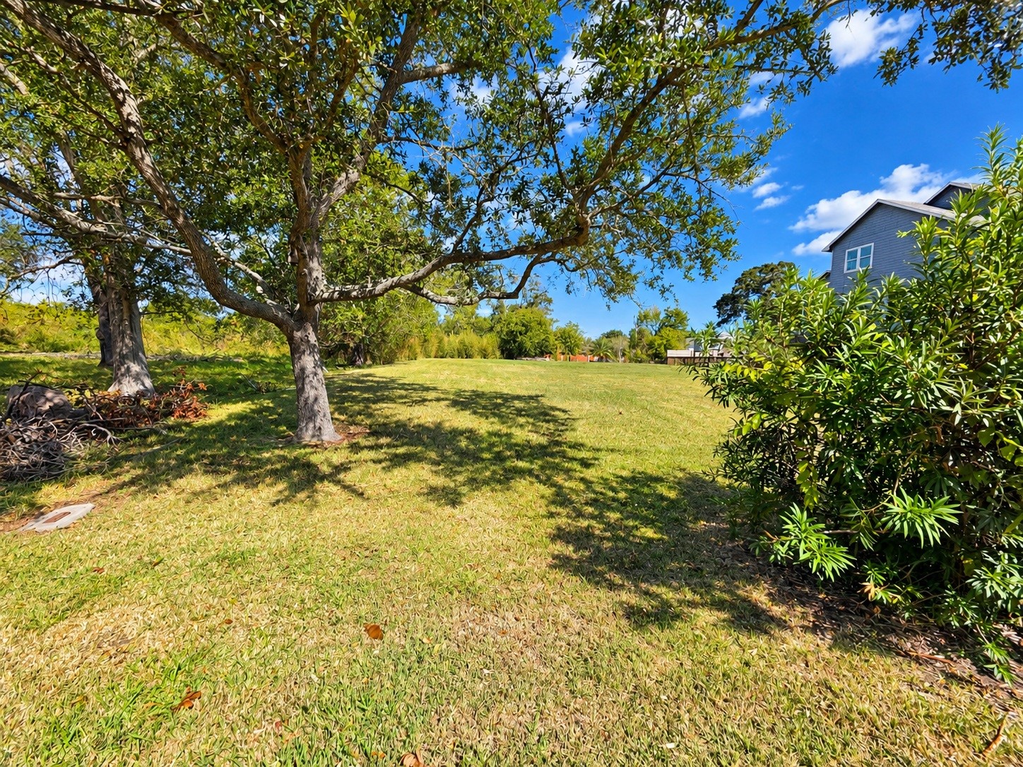 Beautiful partially cleared lot offering scenic water views.