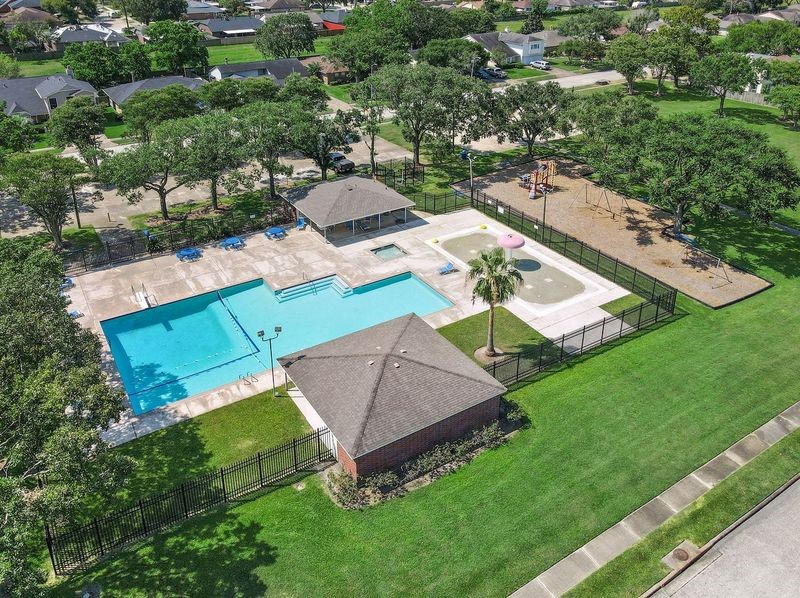 Enjoy Neighborhood Amenities Just Two Blocks Away, Featuring a Community Swimming Pool, Splash Pad, Playground, and Plenty of Space for Outdoor Fun!