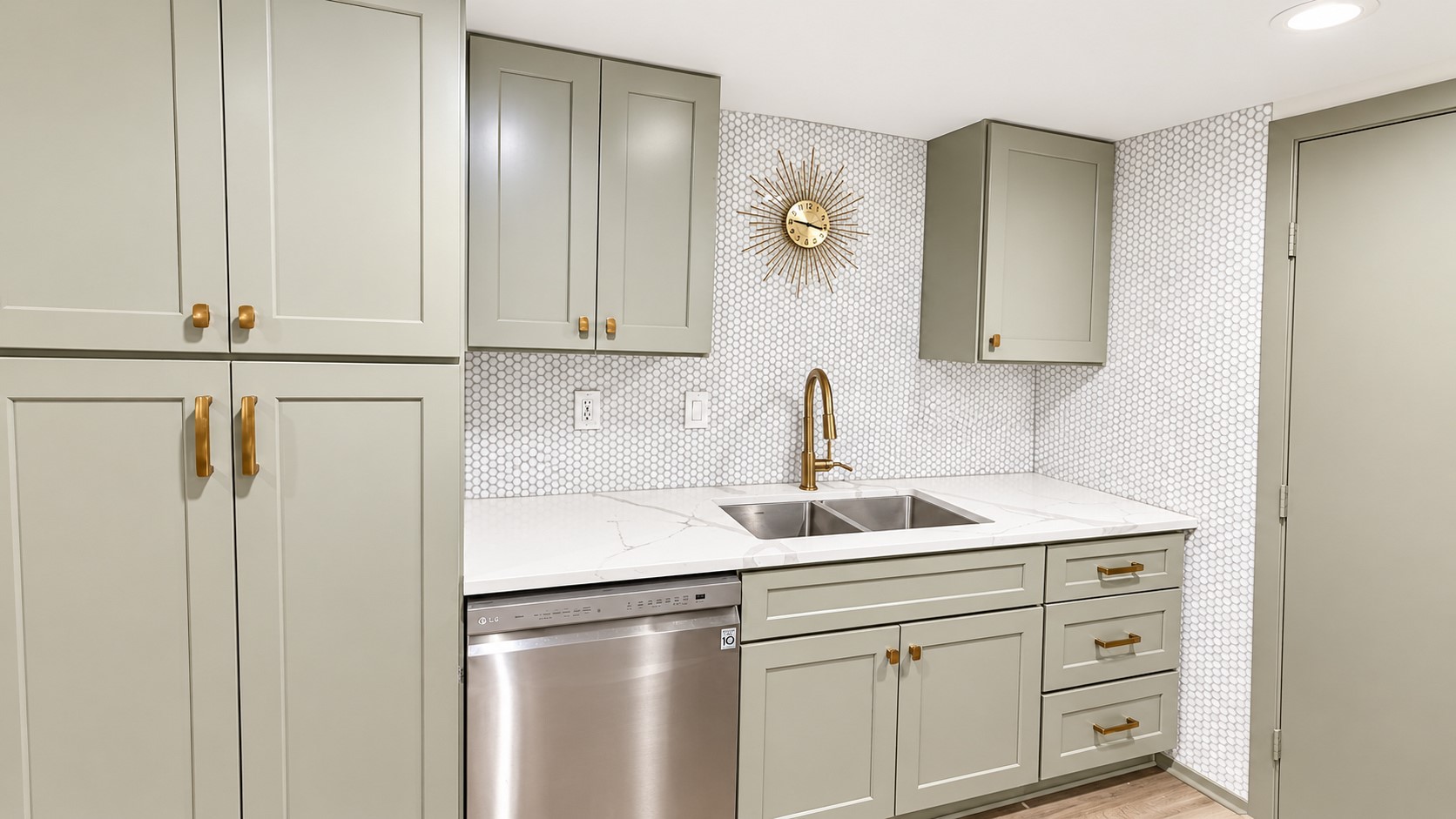 Functional kitchen with custom cabinetry, great counter space and concealed pantry. All appliances included.