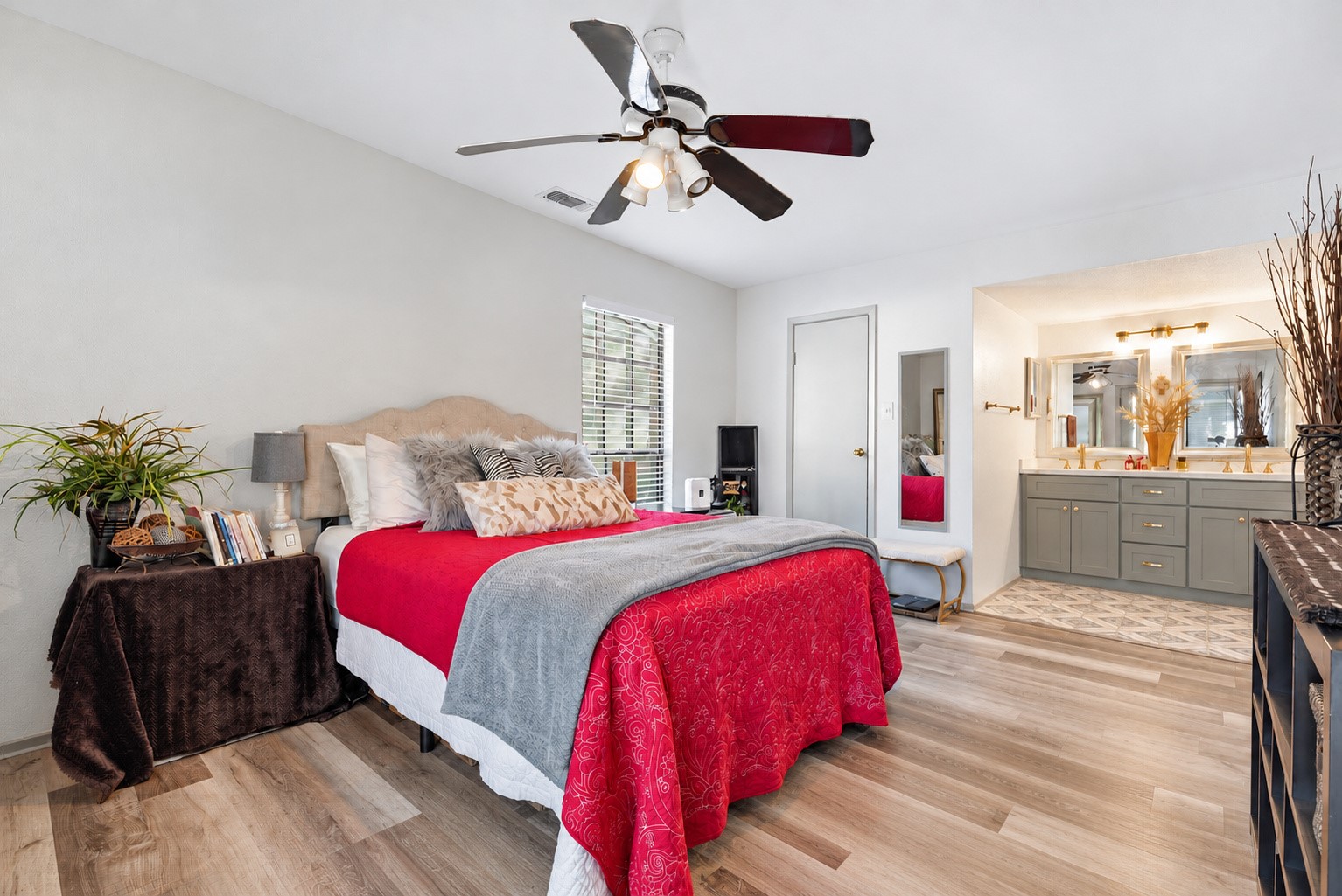 Another view of the primary bedroom highlighting its layout and space.