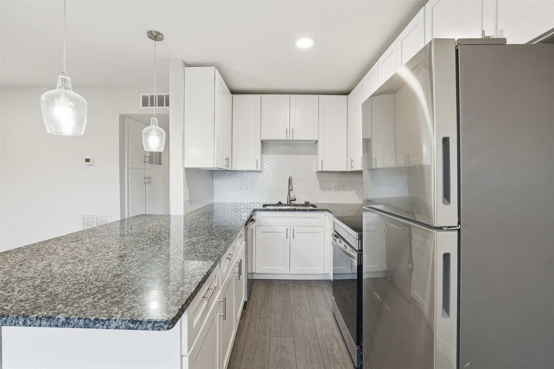 Practical kitchen designed for everyday cooking needs. Photos are of similar unit with identical floor plan. Practical kitchen designed for everyday cooking needs. Photos are of similar unit with identical floor plan.