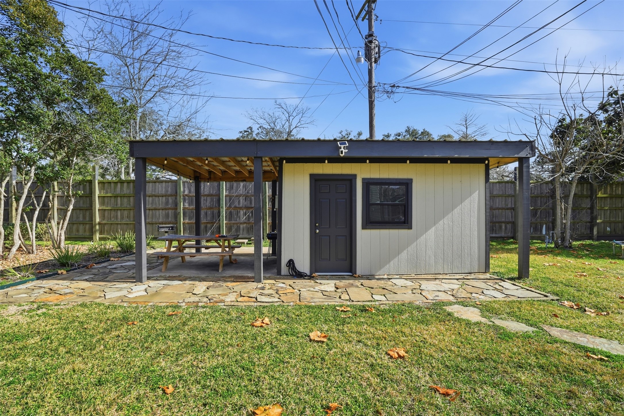 Step outside to a functional and inviting utility area.