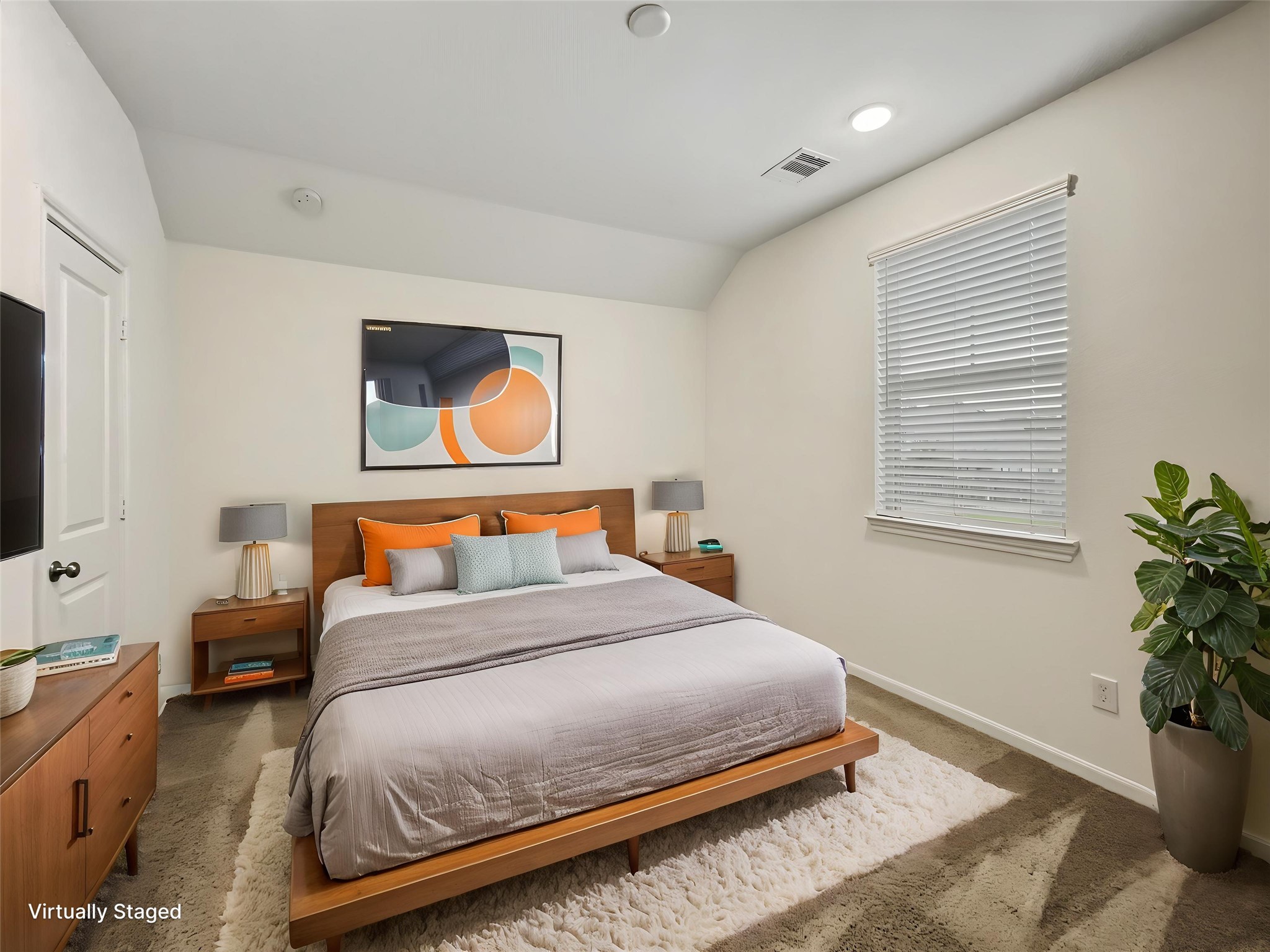 This is a virtual staged view of one of the secondary bedrooms.
