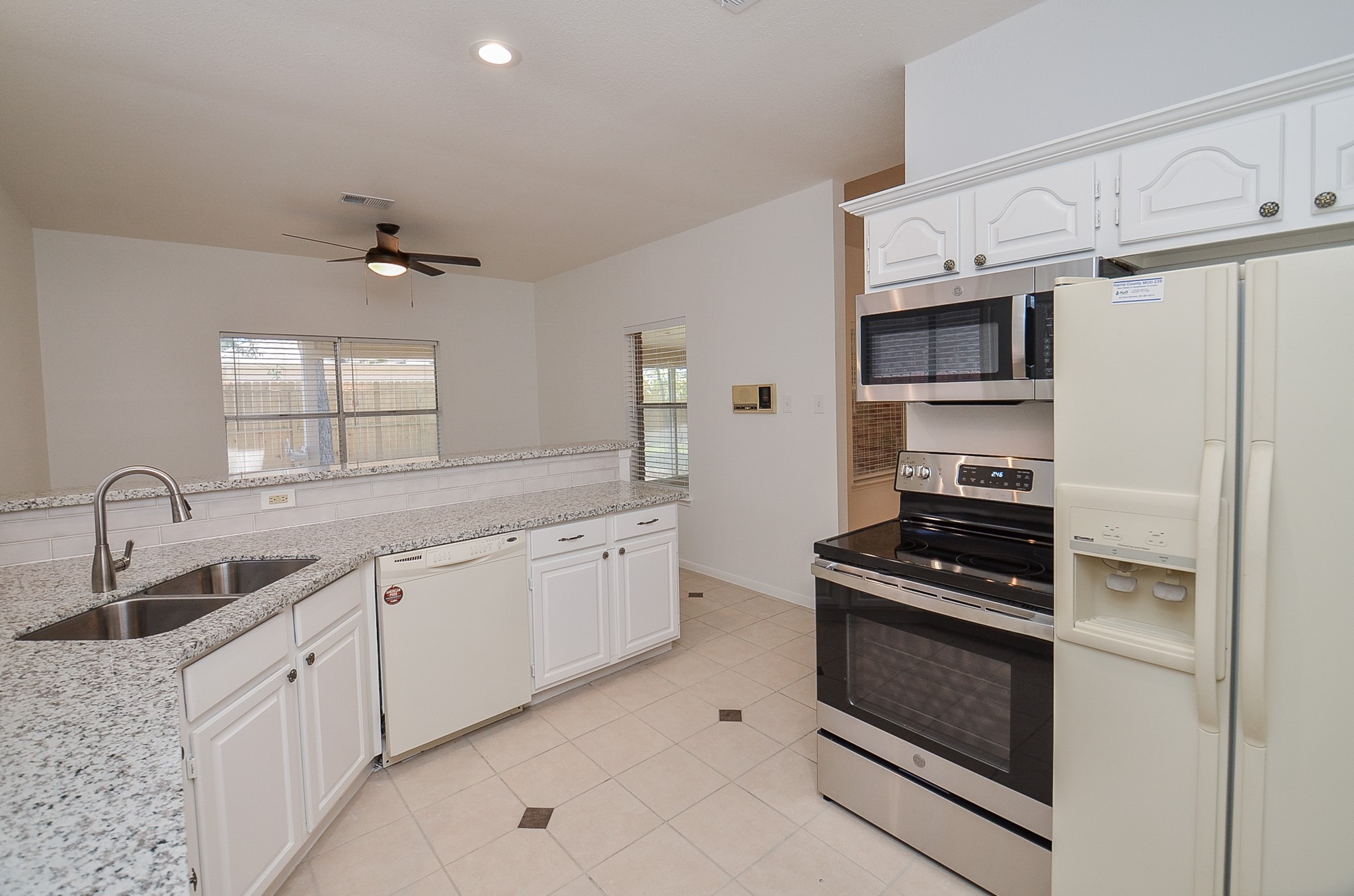New granite counters and new range and microwave.