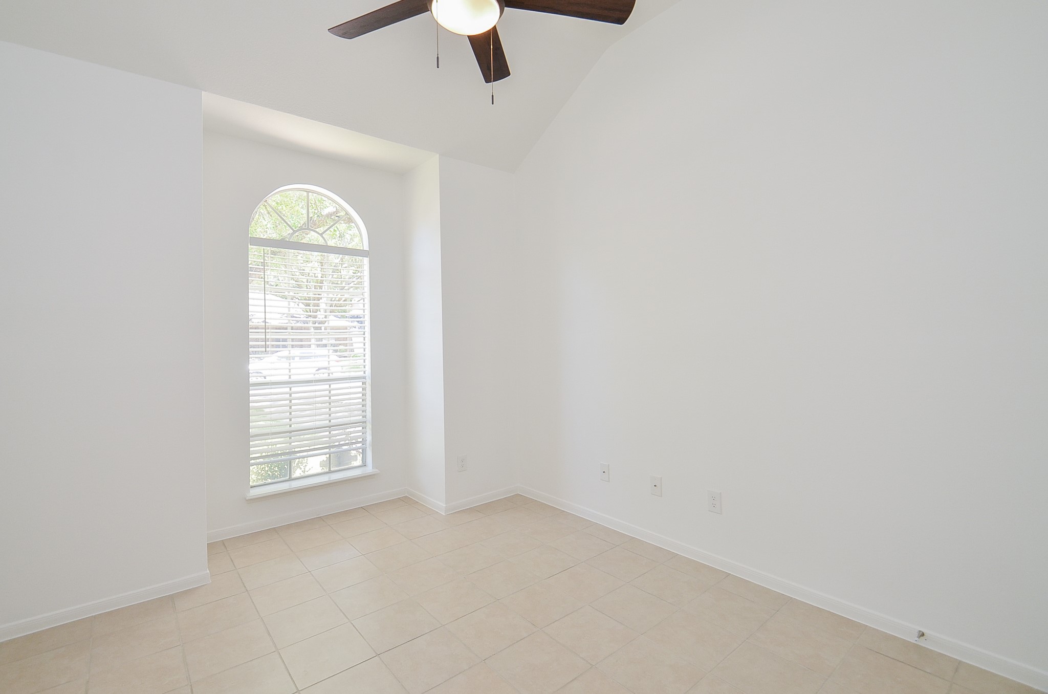 Ceiling fans in both secondary bedrooms.
