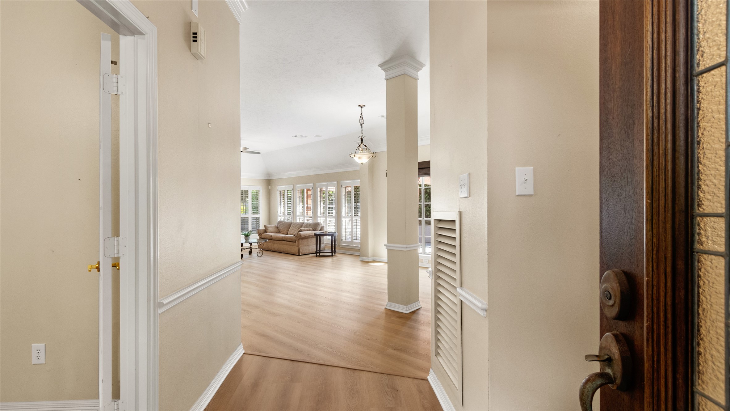 Spacious entryway with new flooring.