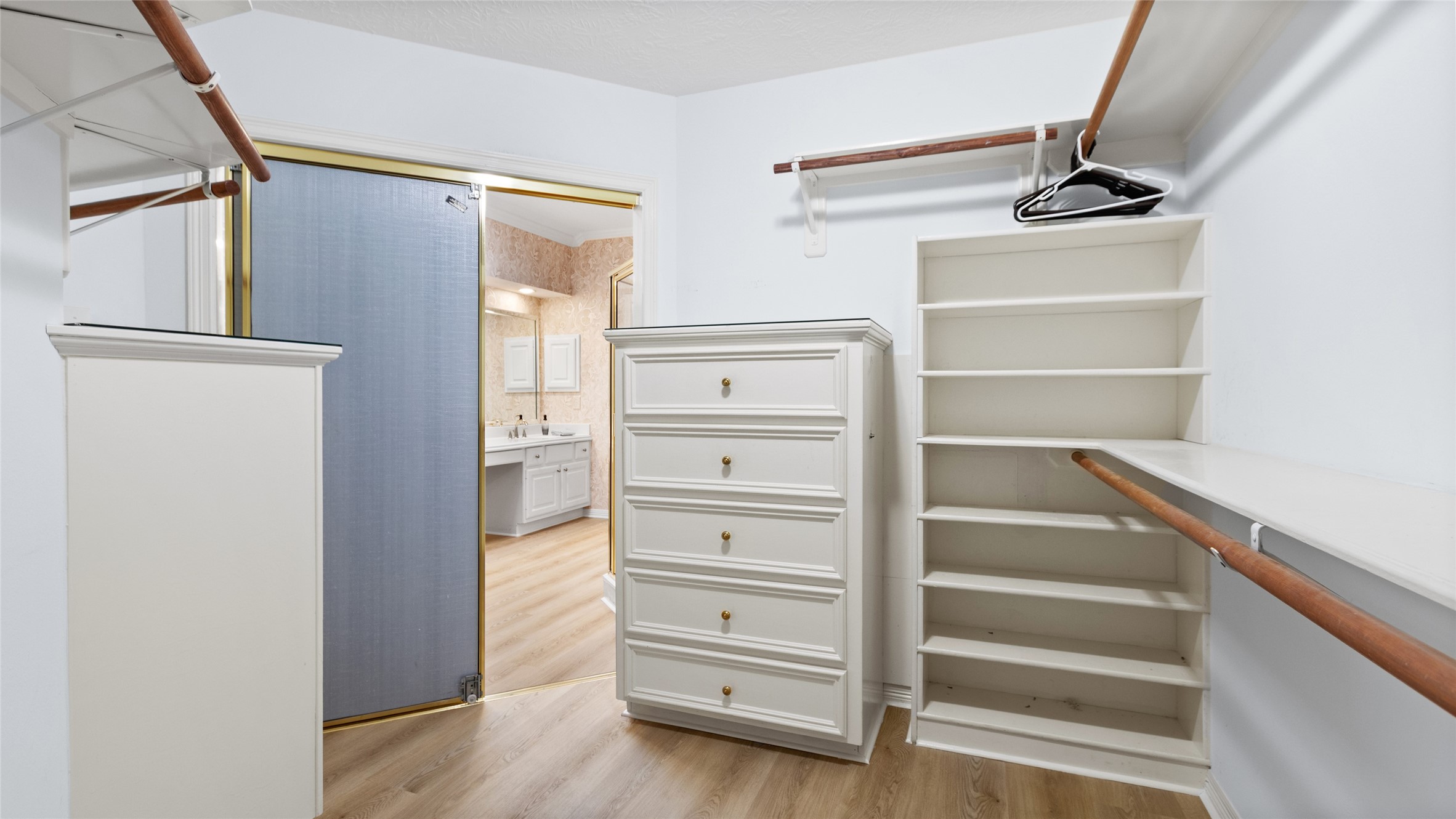 Primary walk in closet.