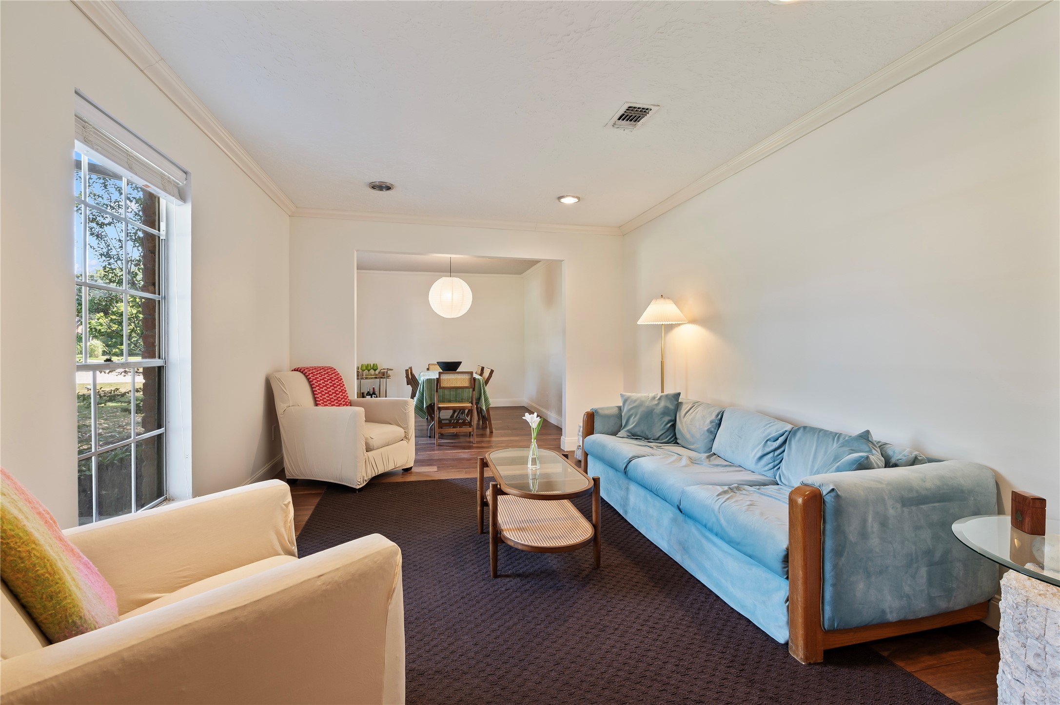 Large family room at the front of the home with great natural lighting.