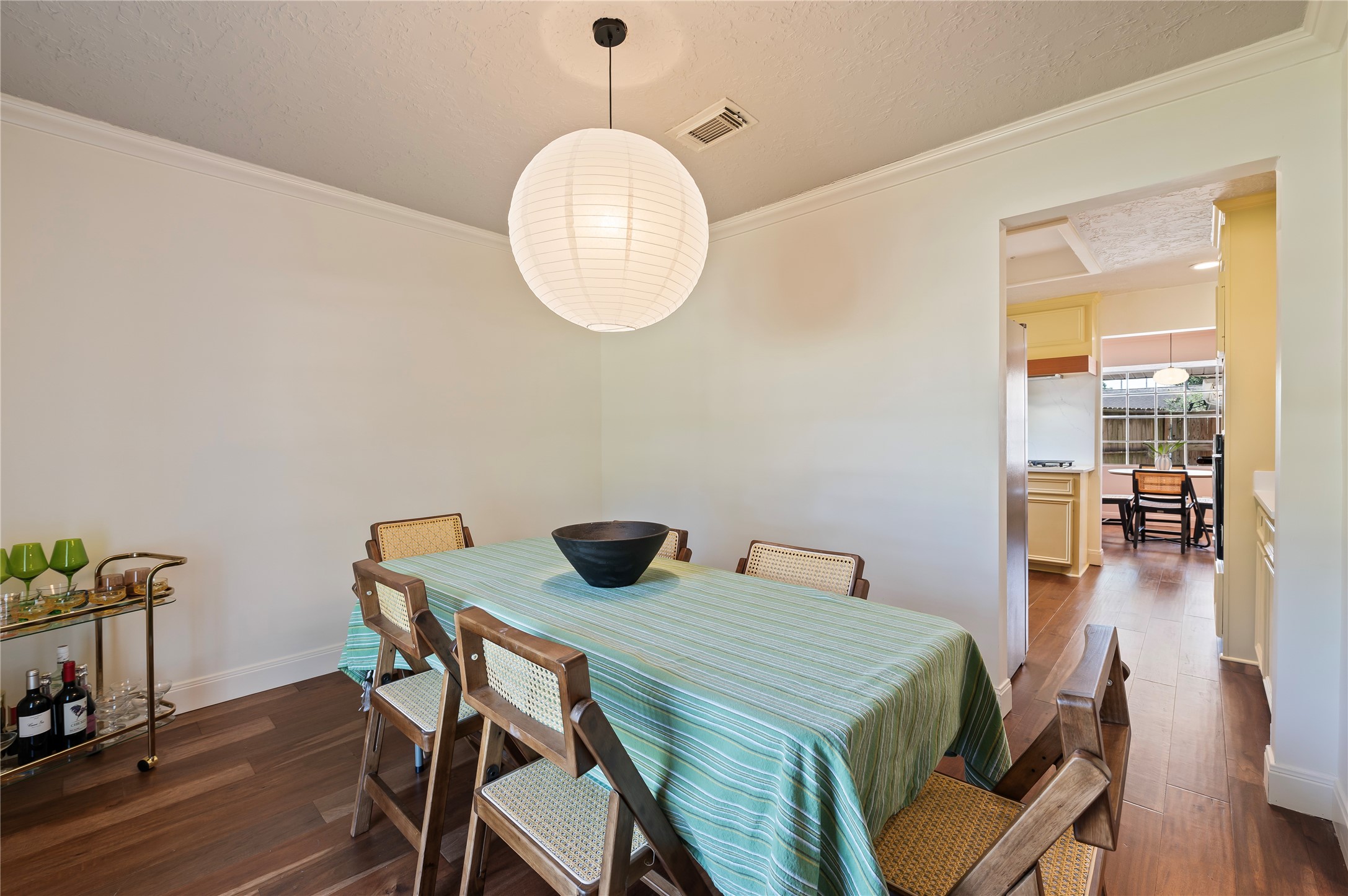 Another view of the spacious formal dining with easy and direct access to the kitchen.