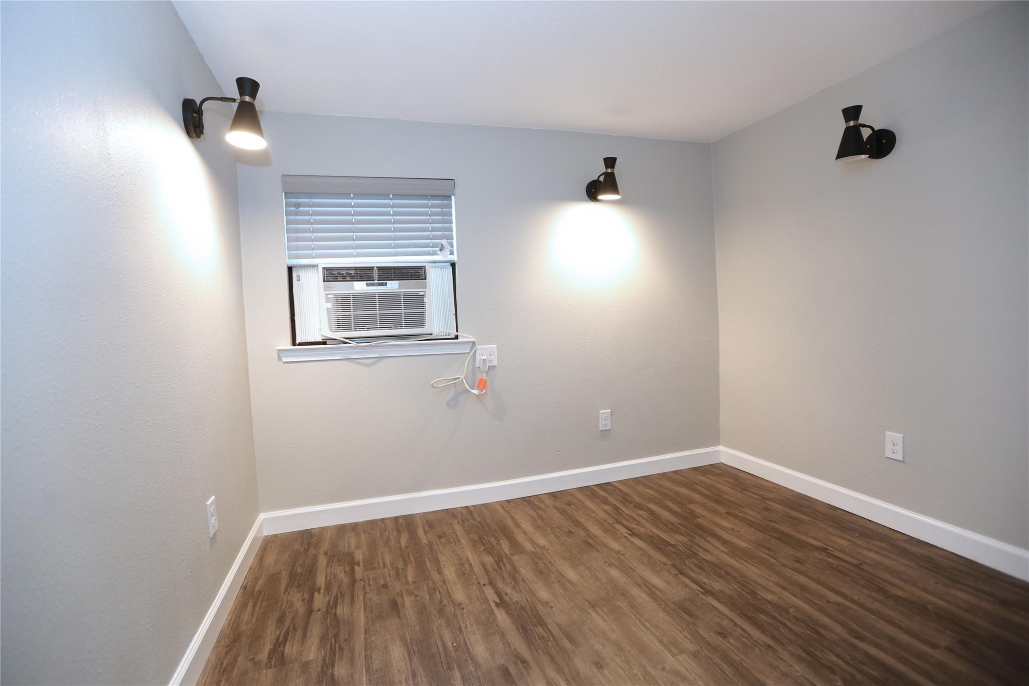 The bedroom is nicely sized with w dual cool/heat window unit