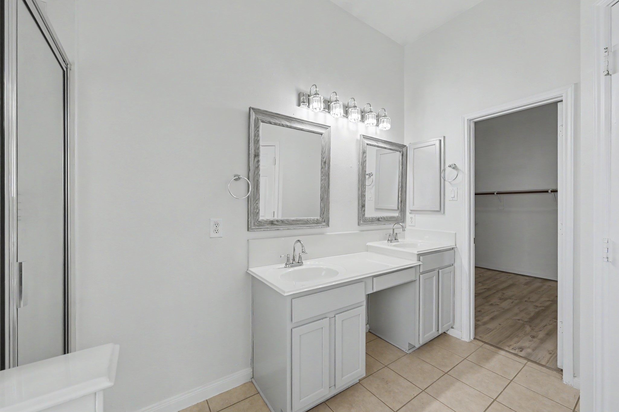 Primary bath featuring dual vanities.