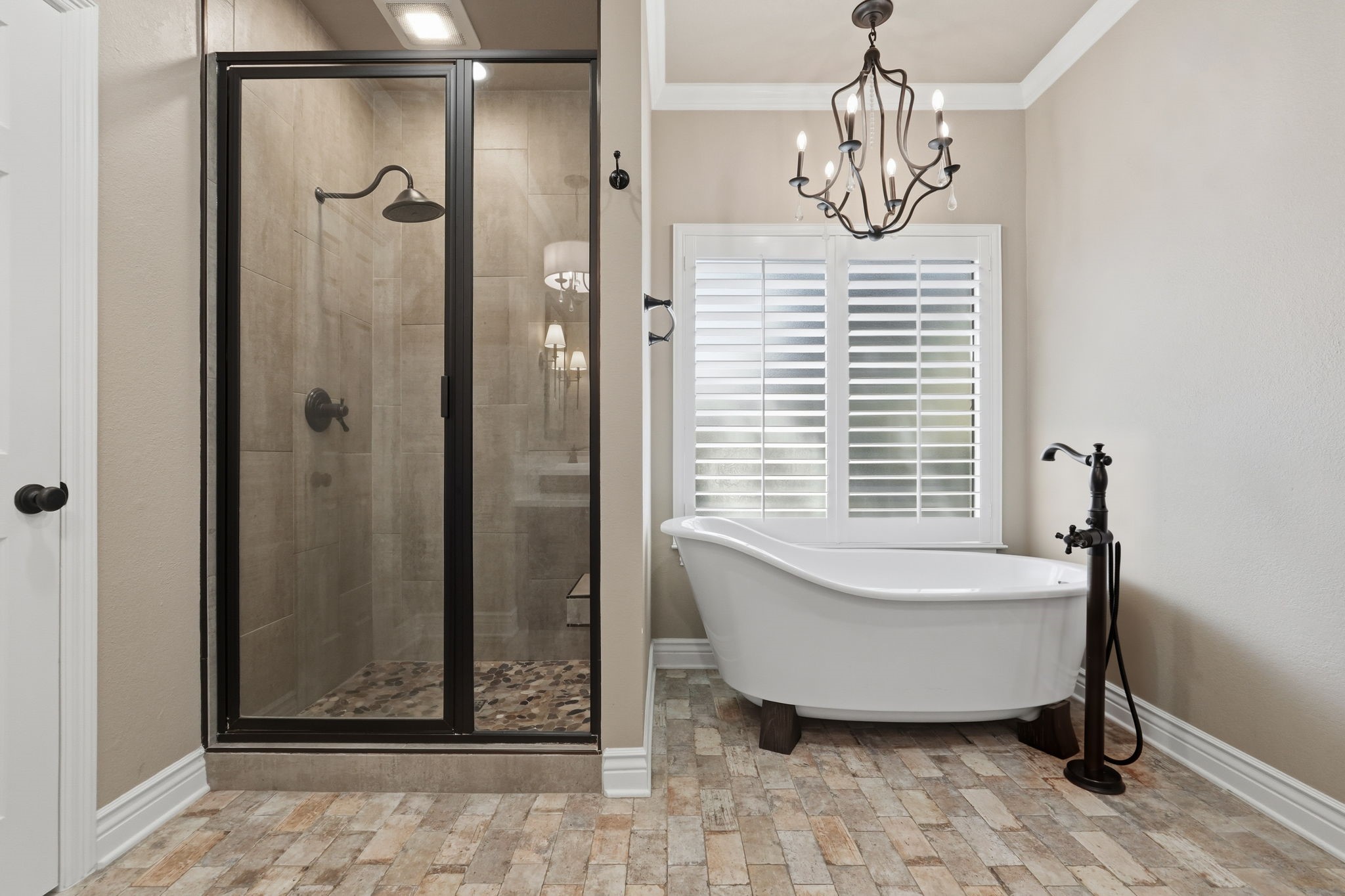 Updated bath with walk-in shower and soaking tub.