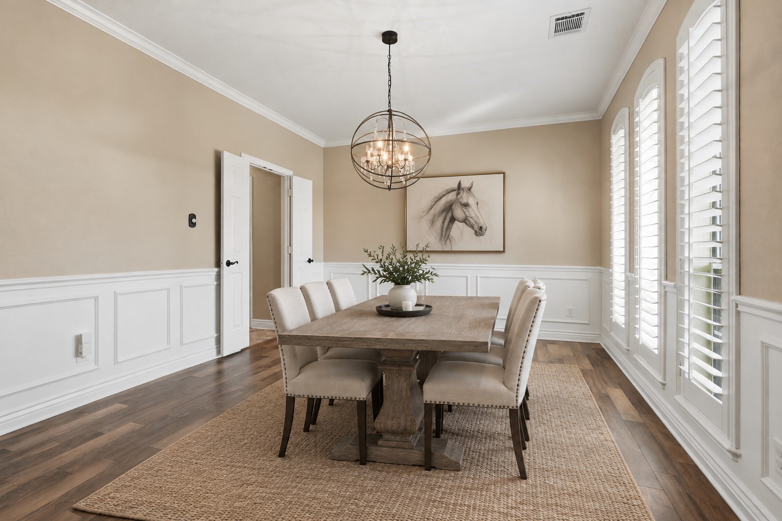 Formal dining room with easy kitchen access. *AI staged*