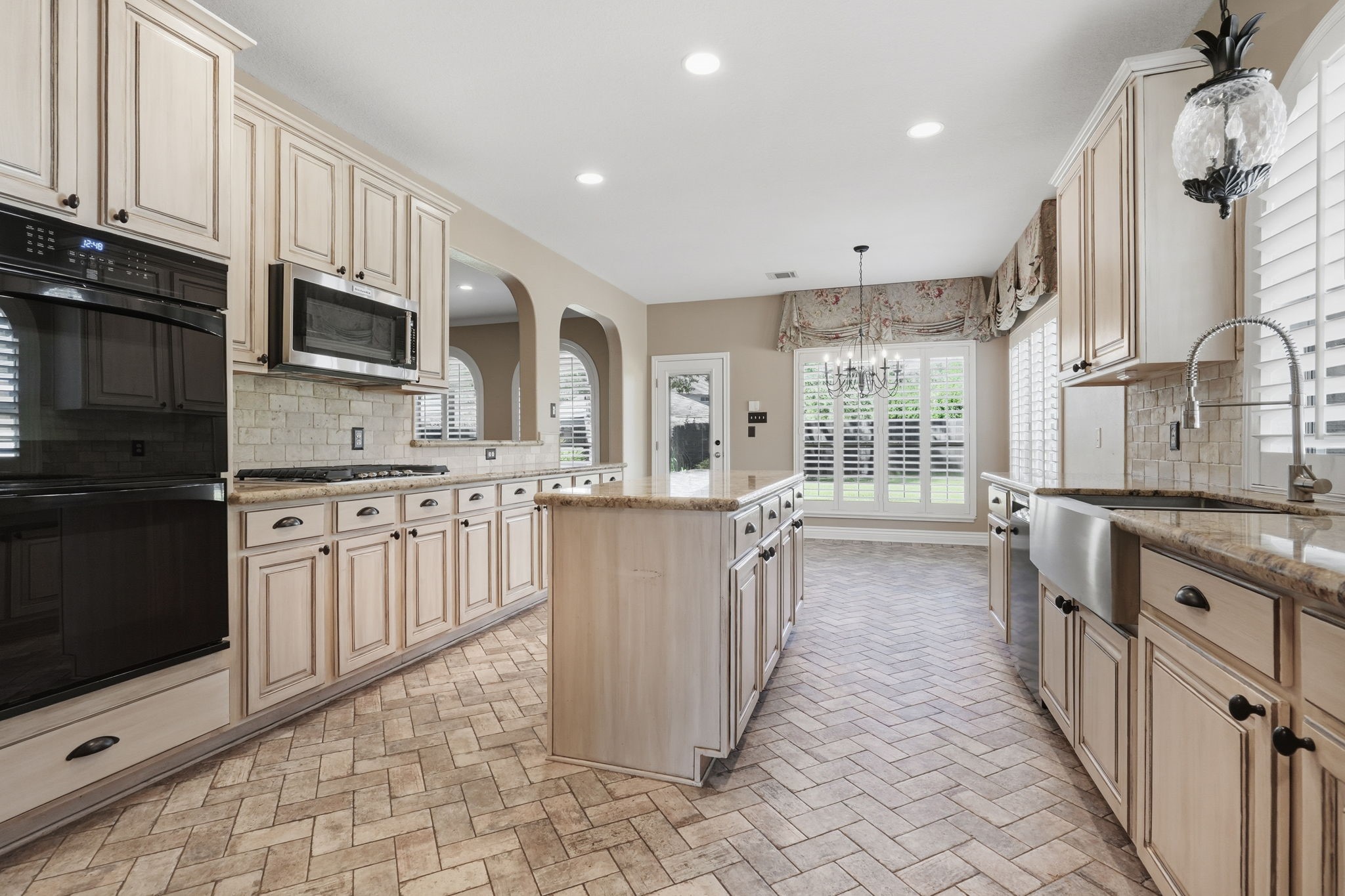 Updated kitchen with double ovens.