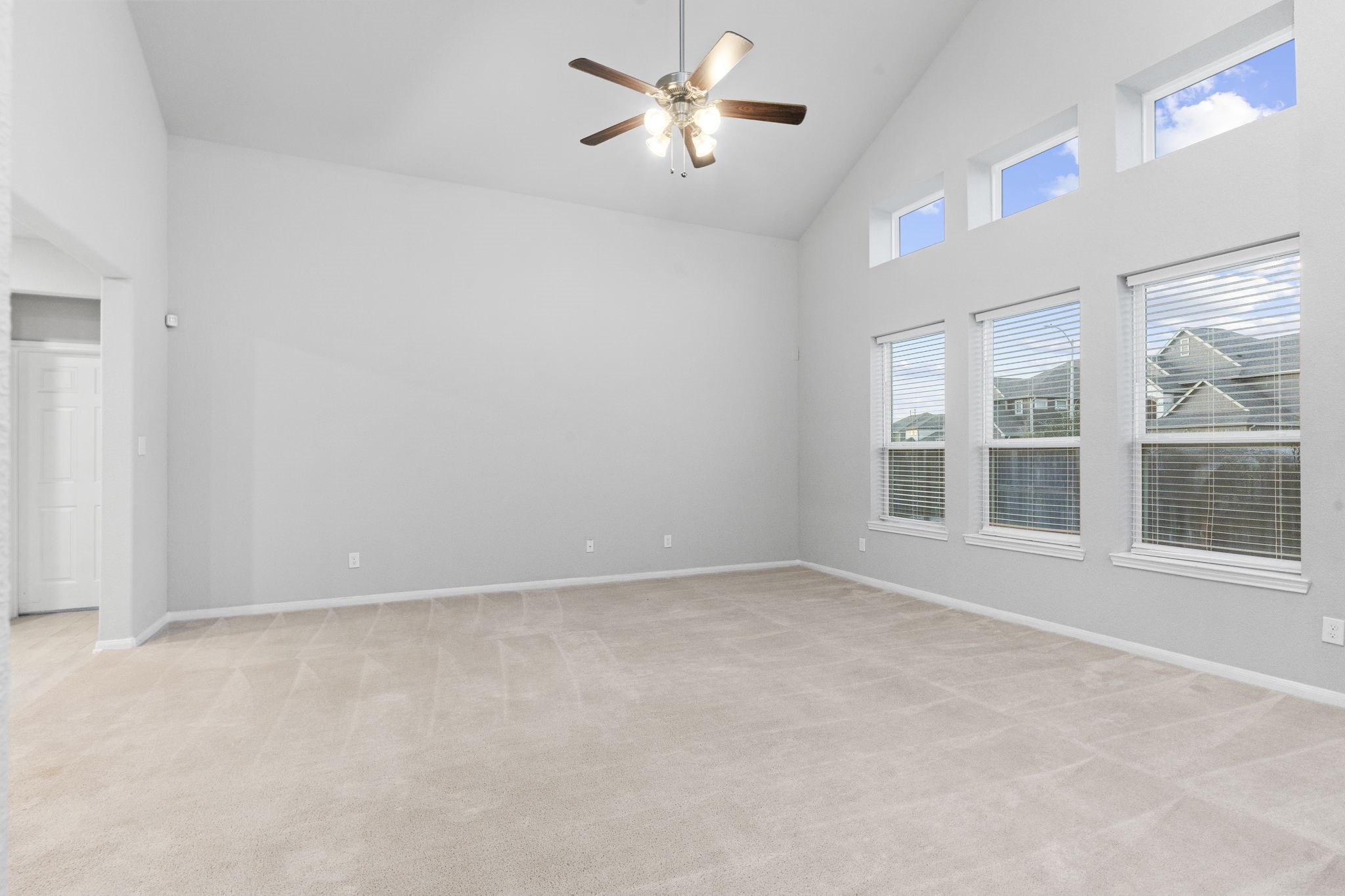 Family Room with wall of windows for ample natural light