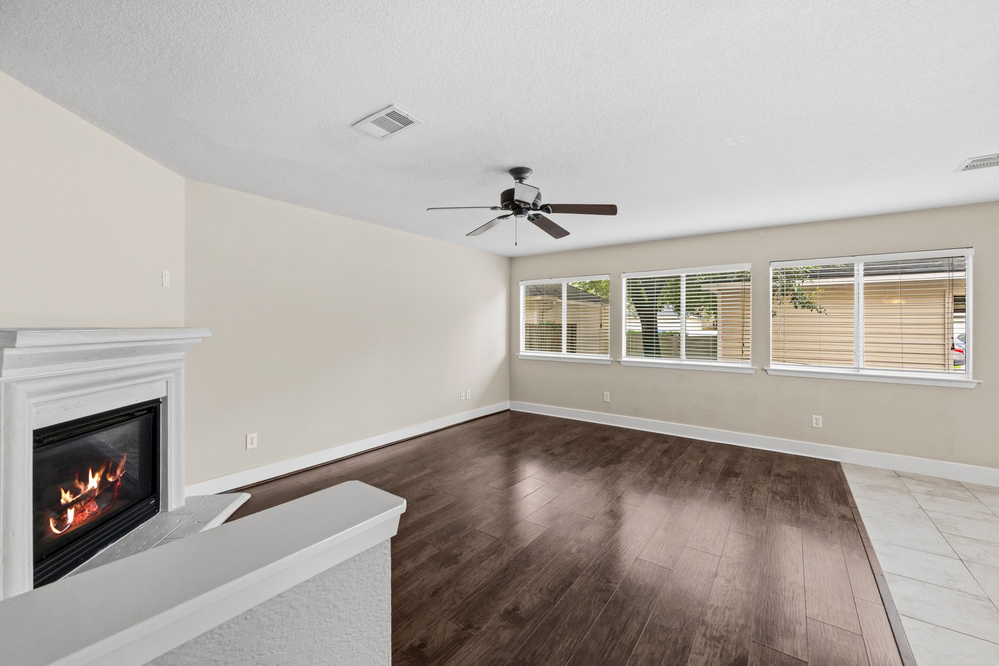 Living area/family room with nice natural lighting.