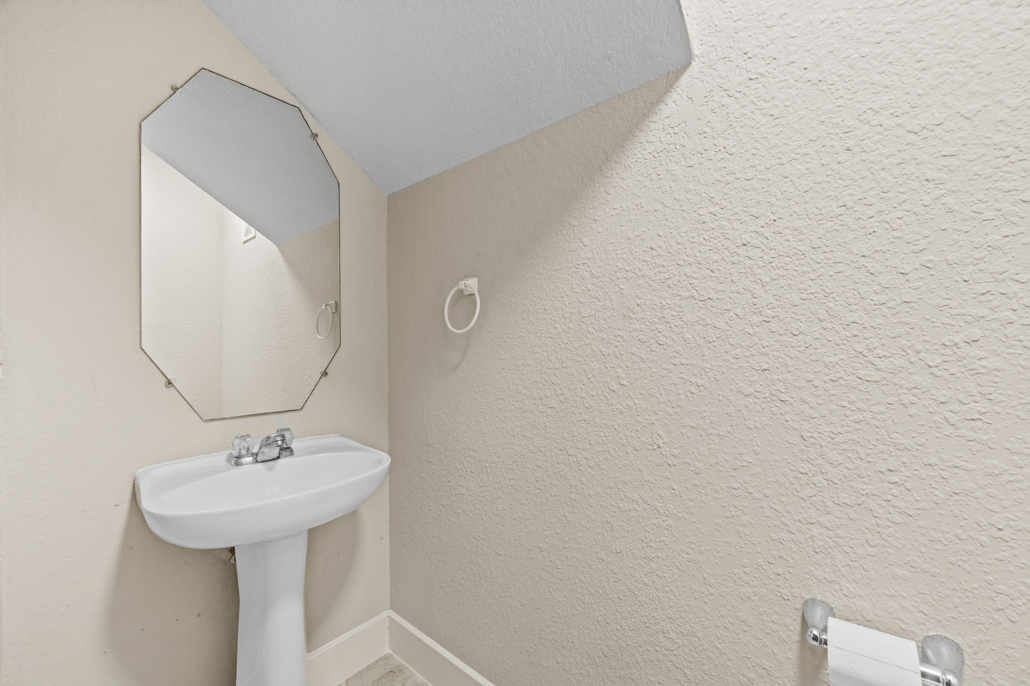 Downstairs half bath/powder room Downstairs half bath/powder room