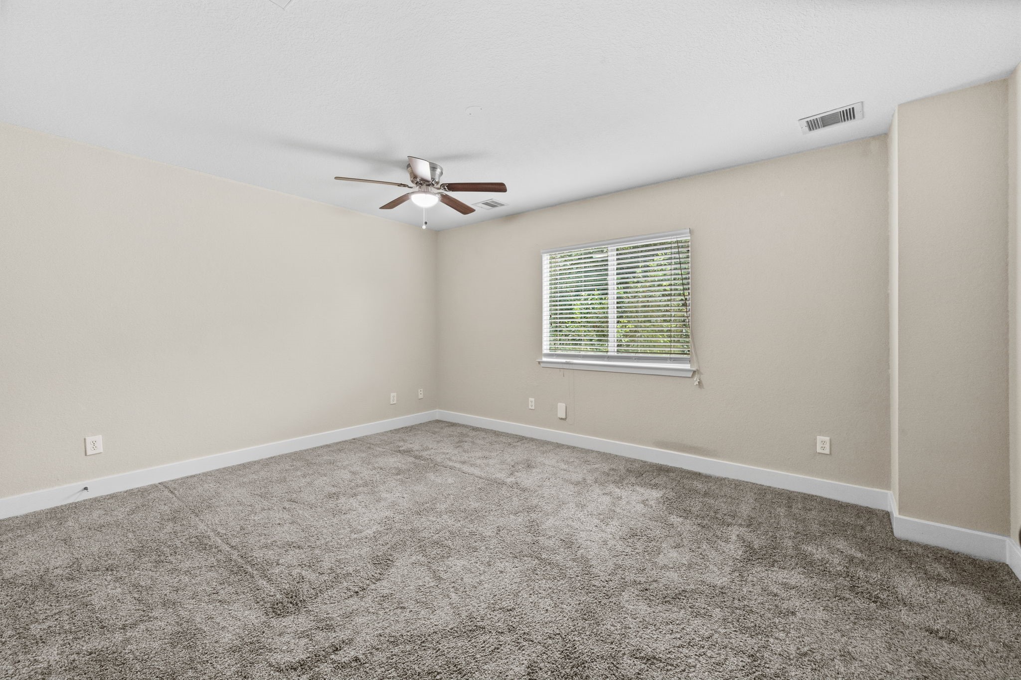 Spacious primary bedroom