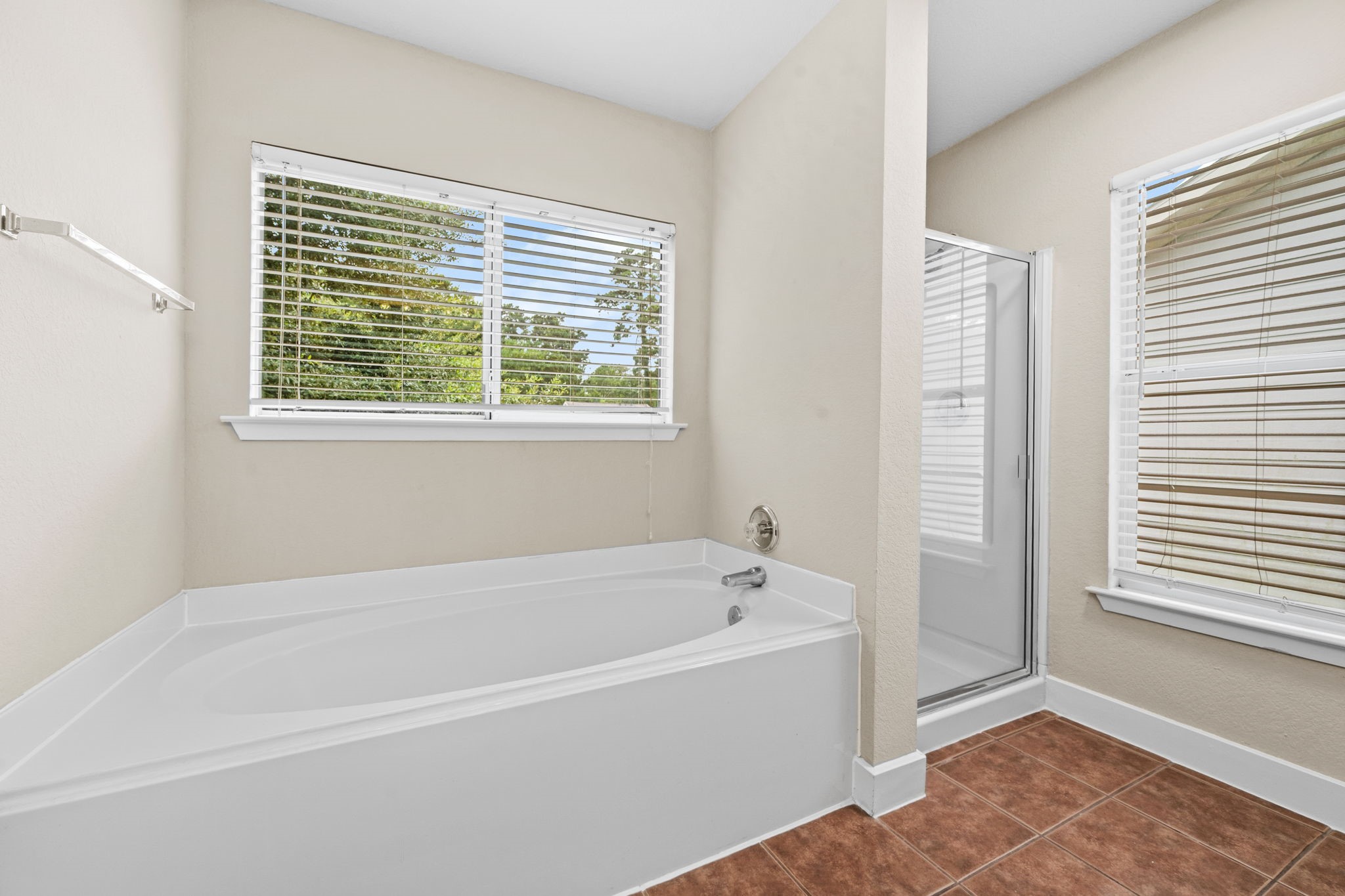 Primary bath with separate tub and shower